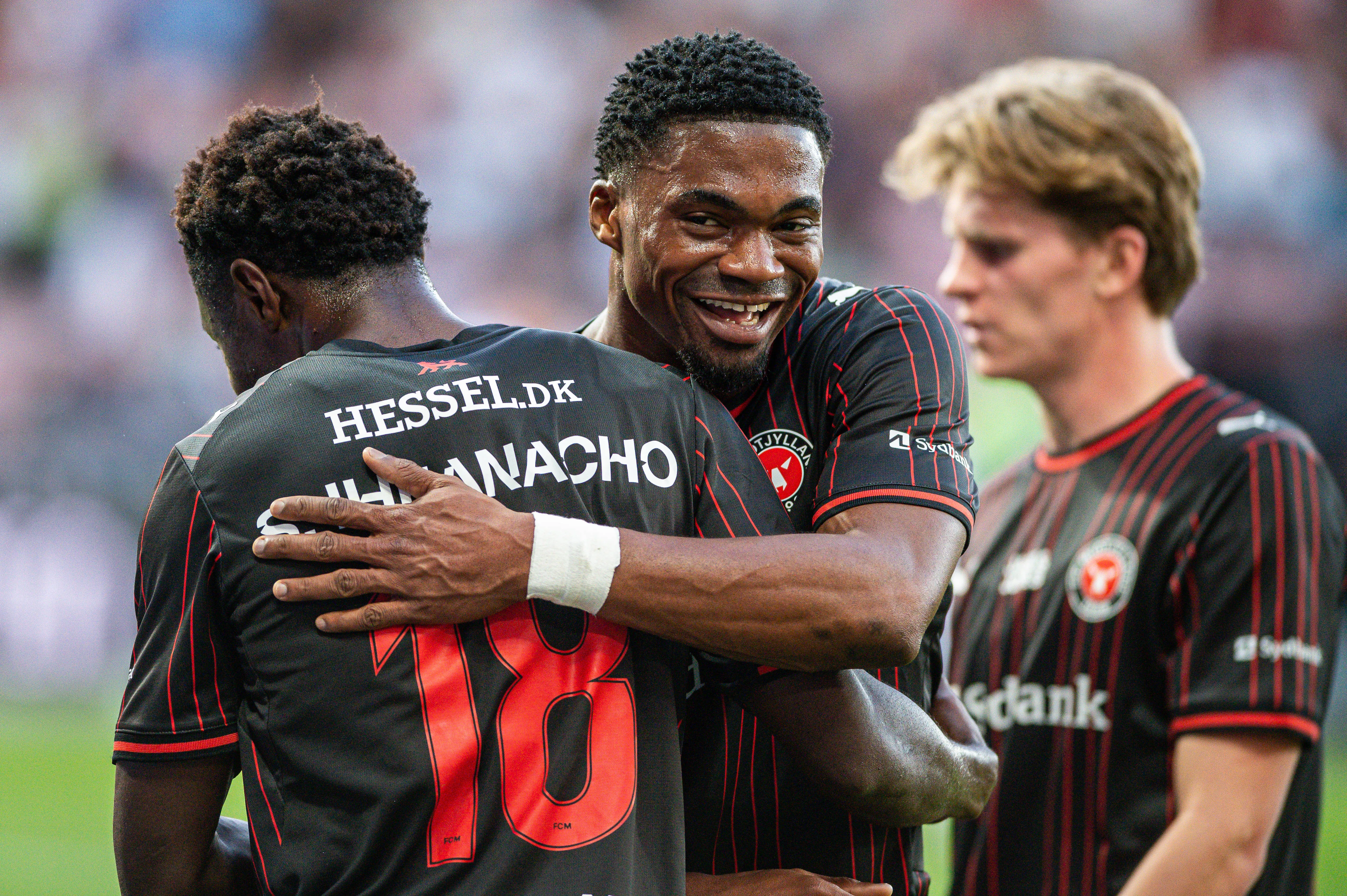 Stanley Iheanacho of FC Midtjylland  celebrates with Friday Etim