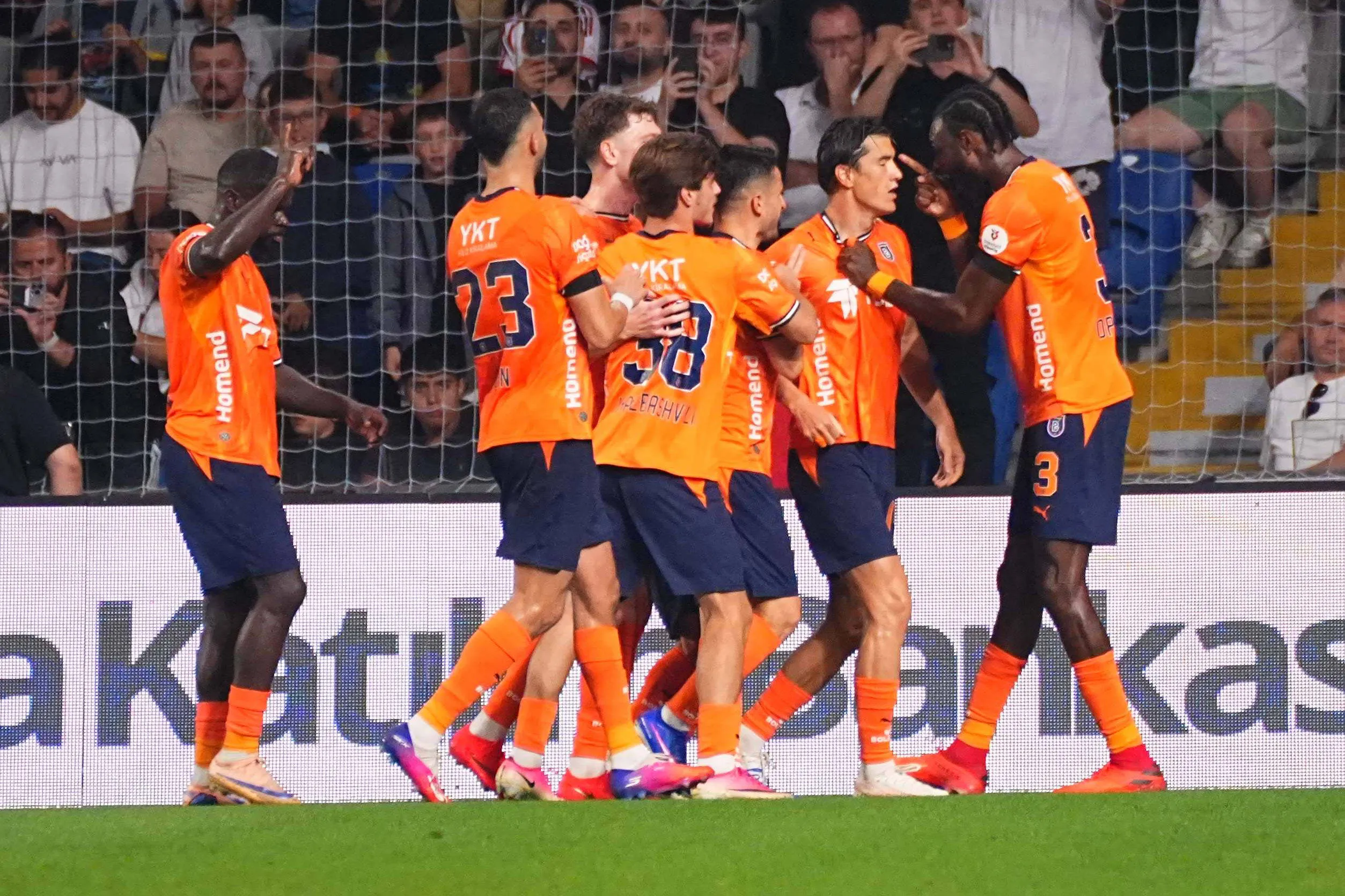 Eldor Shomurodov 14 of Basaksehir FK celebrates with teammates.