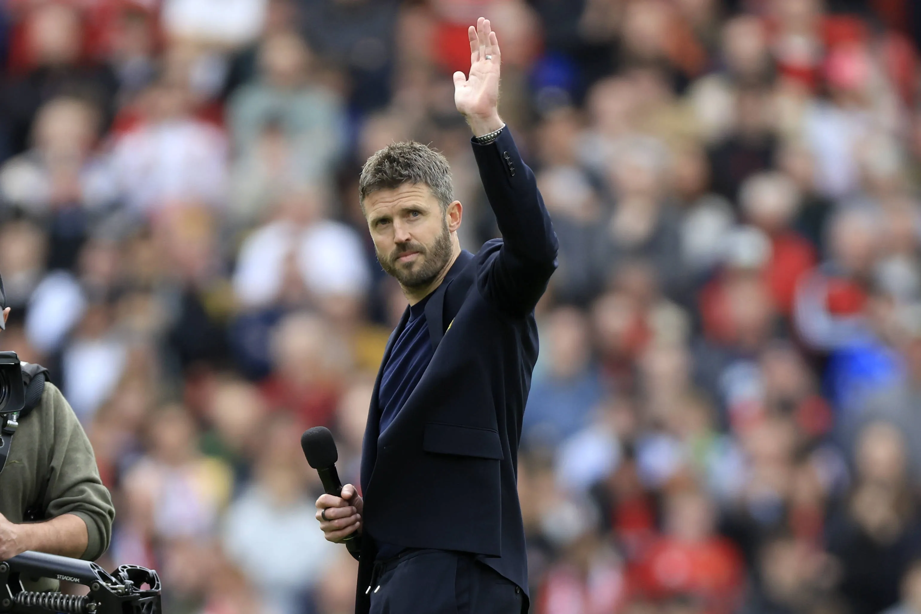 Michael Carrick, Manager of Manchester United salutes the fans after the Premier League match between Manchester United and Nottingham Forest at Old Trafford on May 17, 2026 in Manchester, England