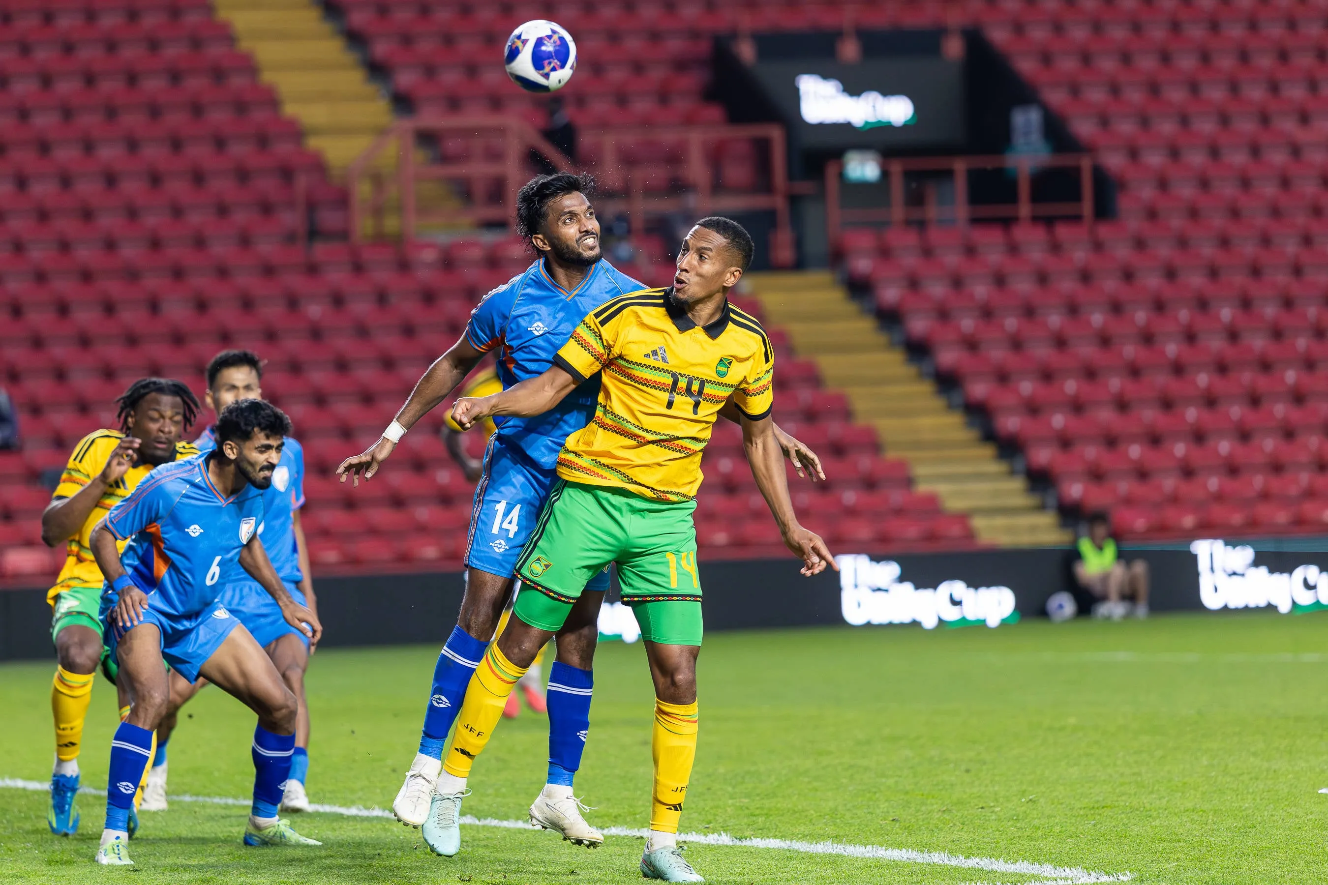 India's Choudhary Farukh heads the ball away from Jamaica's midfielder Isaac Hayden 14 during the Unity Cup London 2026 match between India and Jamaica at The Valley, London.