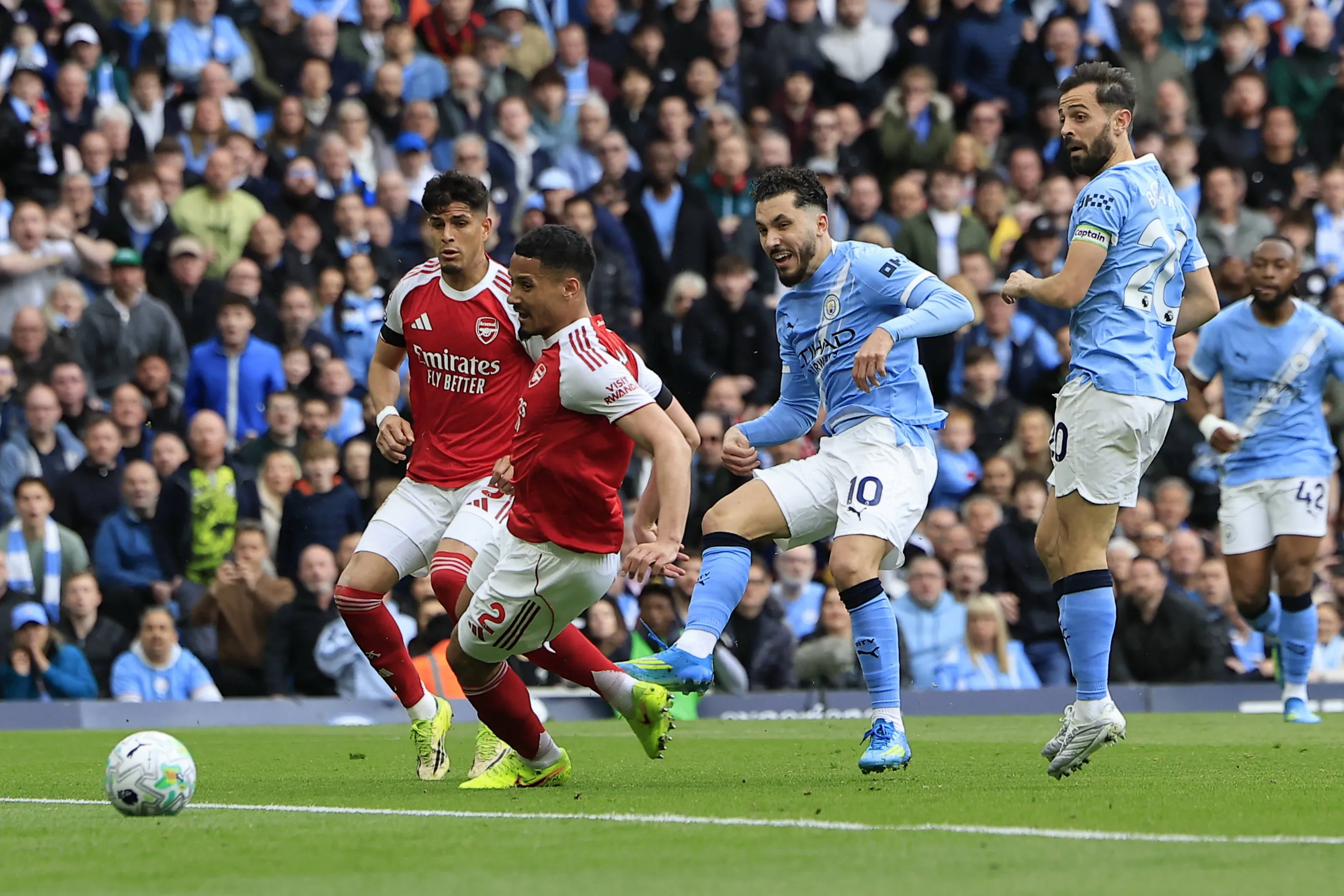Rayan Cherki scores to make it 1-0 during the Premier League match between Manchester City and Arsenal