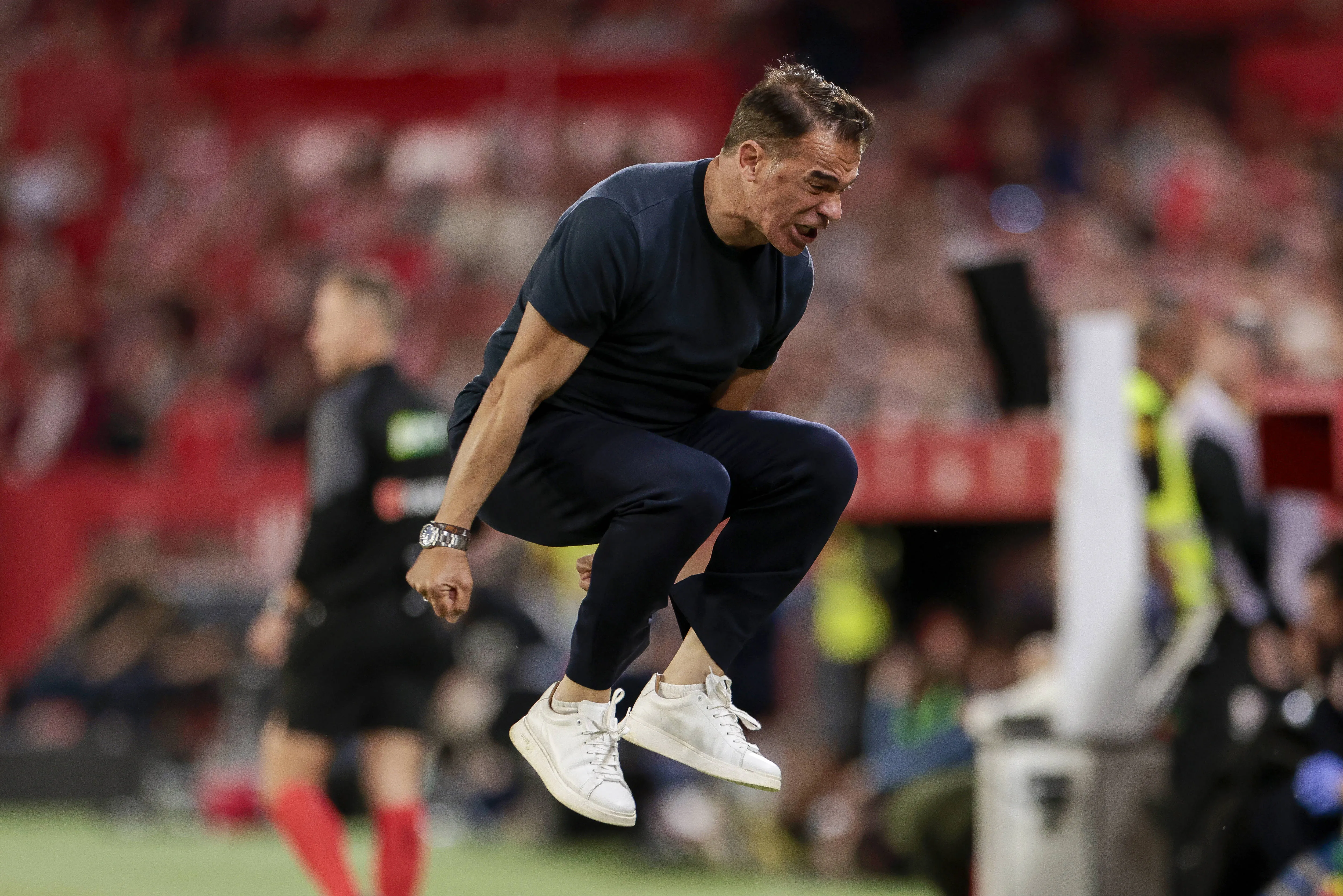 Luis Garcia Plaza, head coach of Sevilla celebrates a goal