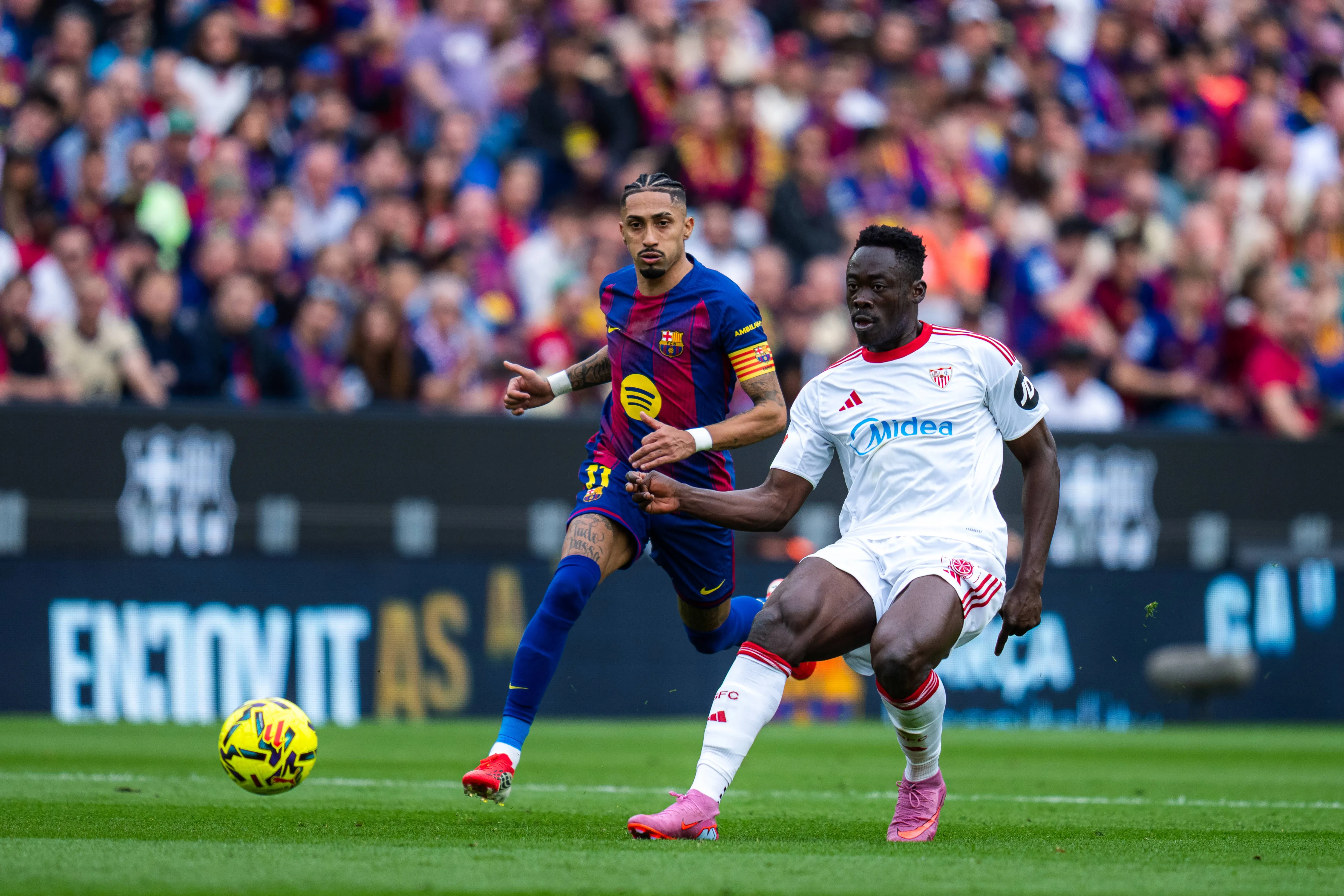 Barcelona player Raphinha and Akor Adams during LaLiga EA Sports match between FC Barcelona and Sevilla