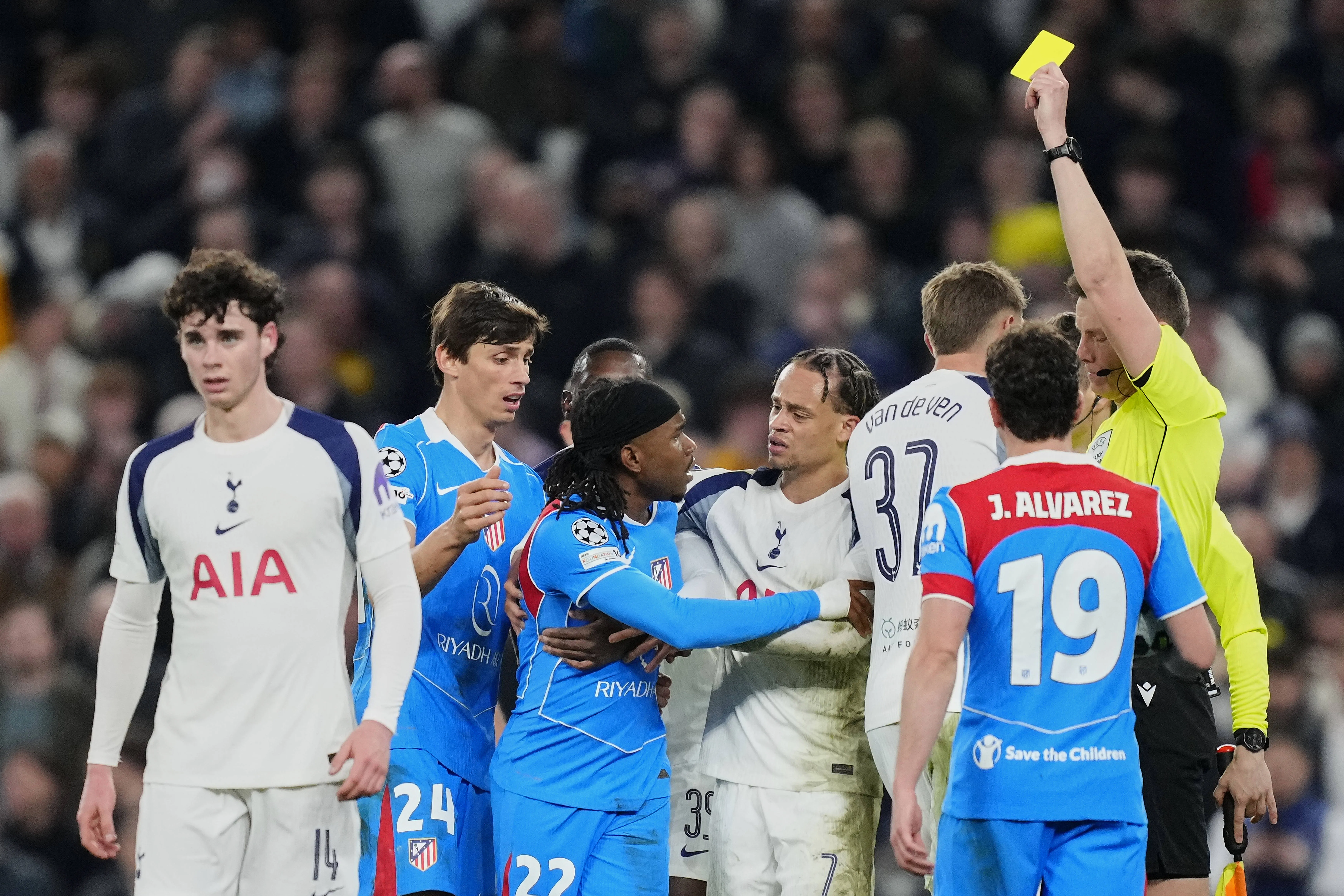 Ademola Lookman is shown a yellow card