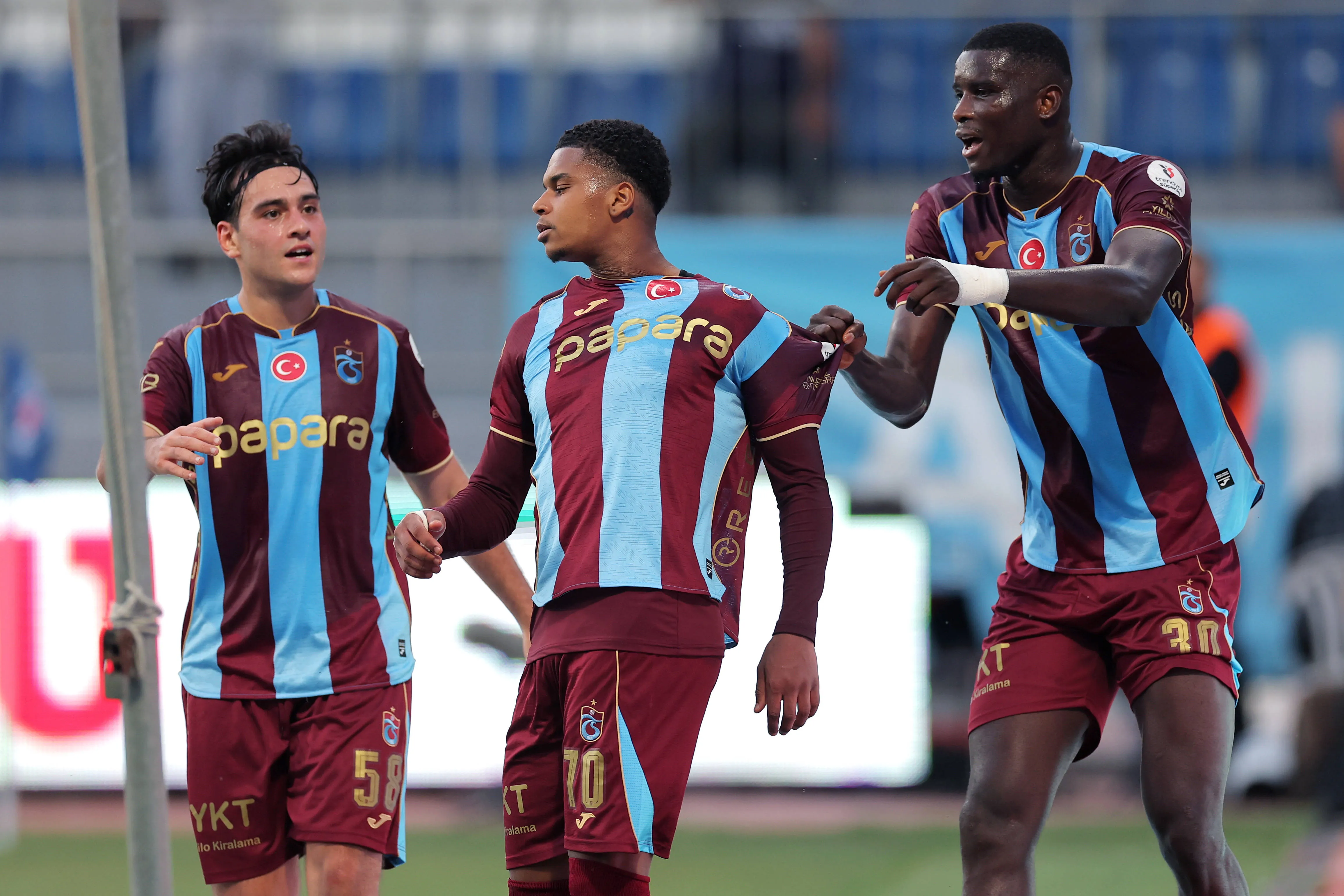 Noah Saviolo, Aral Simsir and Paul Onuachu of Trabzonspor