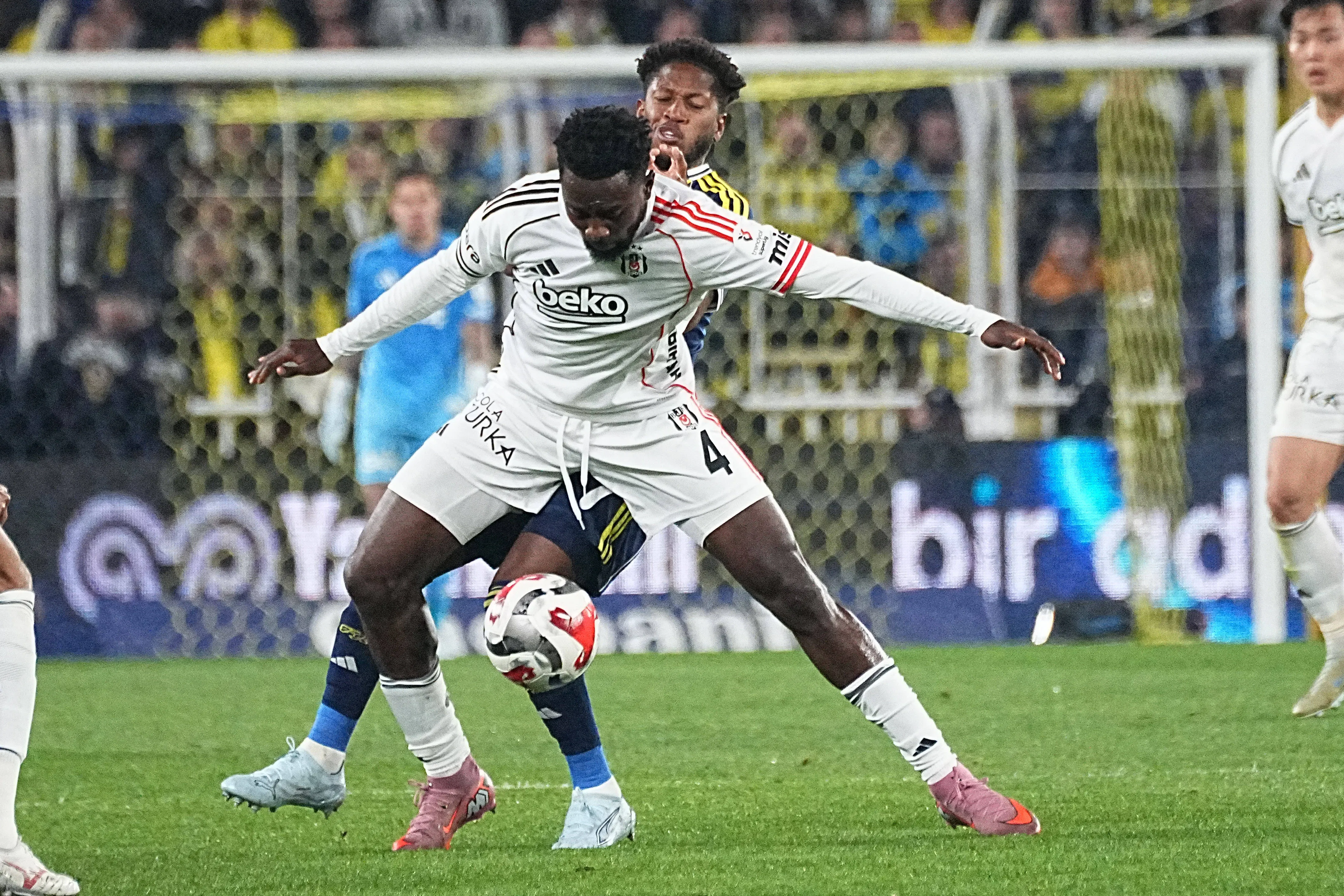 Fred back of Fenerbahce and Wilfred Ndidi 4 of Besiktas during the Trendyol Turkish S&uuml;per League match between Fenerbahce SK and Besiktas JK at Chobani Stadium on April 5, 2026