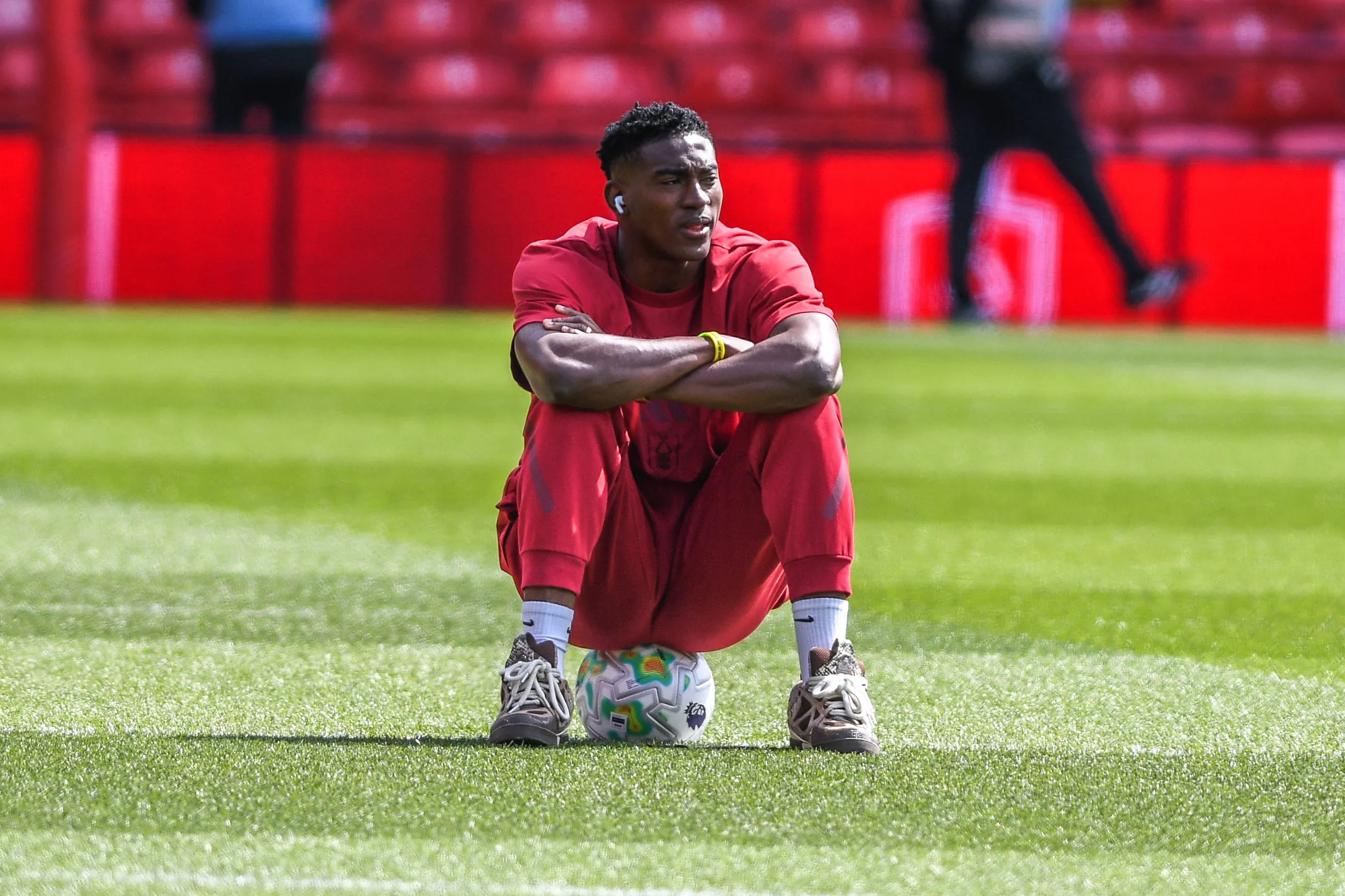 Nottingham Forest s Taiwo Awoniyi sitting on the ball and deep in though before todays match.