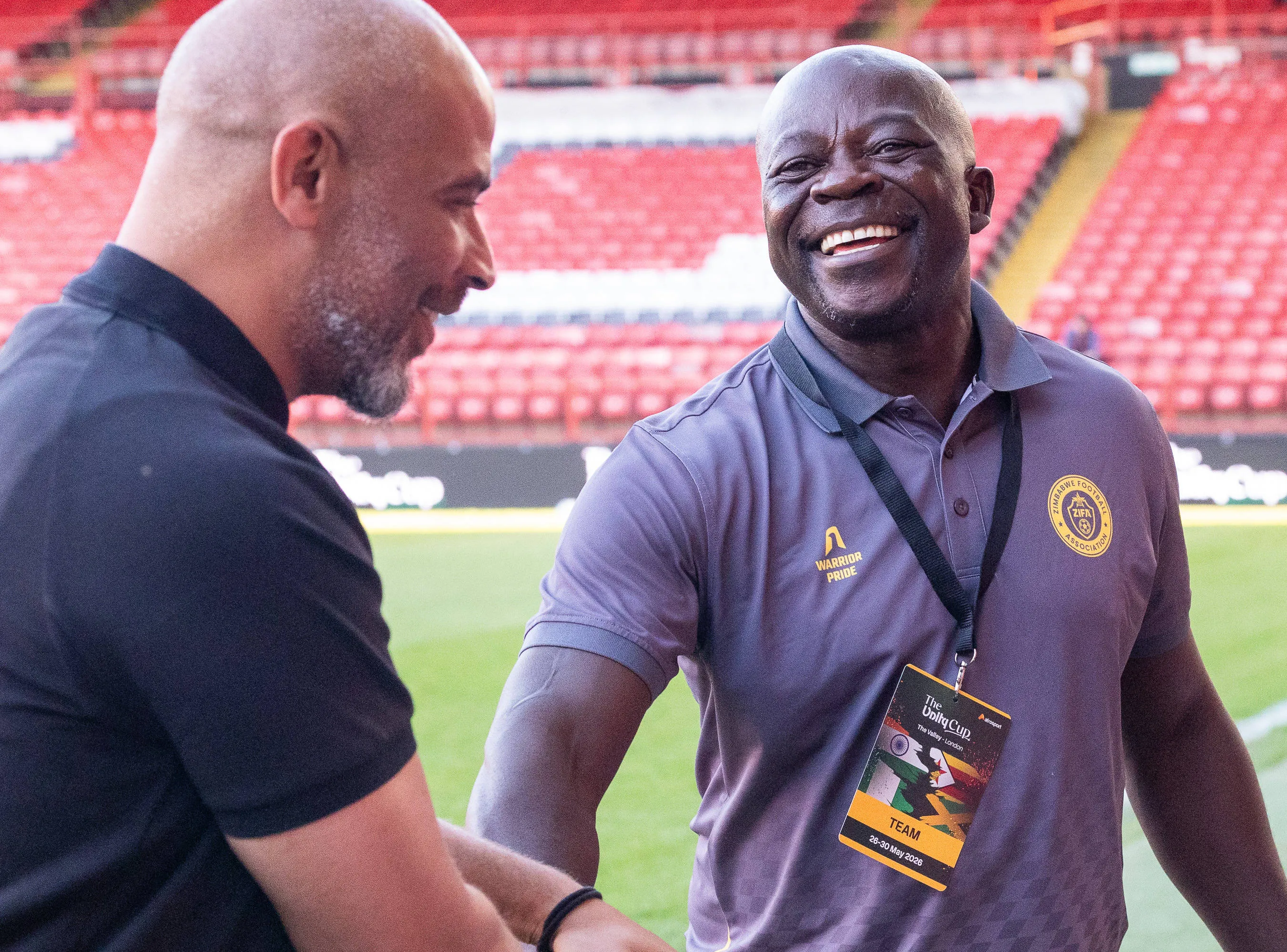 Nigeria manager Eric Chelle greets Zimbabwe manager Kaitano Temb during the Unity Cup London 2026 match between Nigeria and Zimbabwe at The Valley, London, UK on 26 May 2026. 
