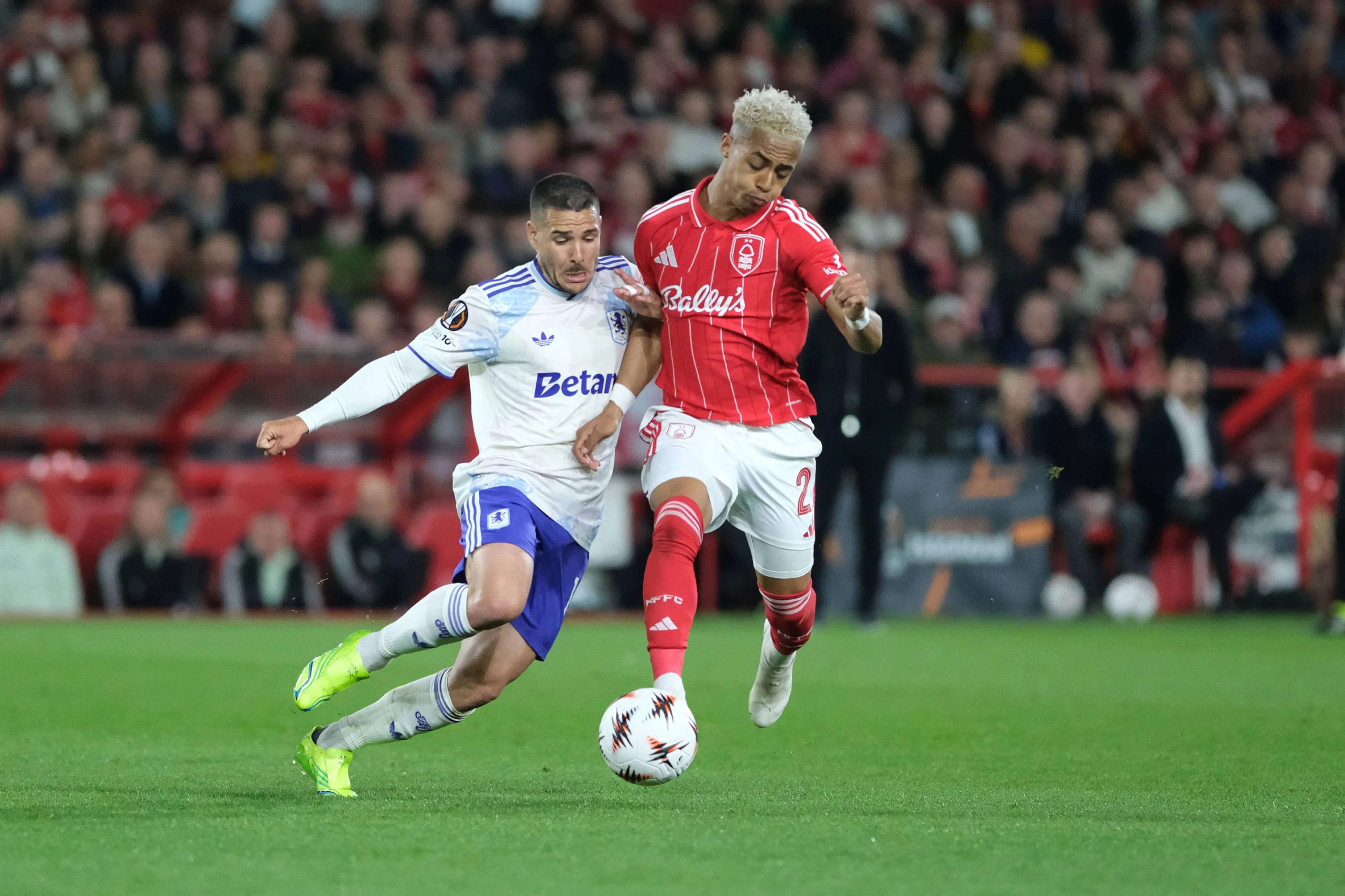 Omari Hutchinson of Nottingham Forest and Emiliano Buendia of Aston Villa seen in action during the UEFA Europa League Semi Final first leg football match between Nottingham Forest and Aston Villa at City Ground. Final score  Nottingham Forest 1 : 0 Aston Villa.  