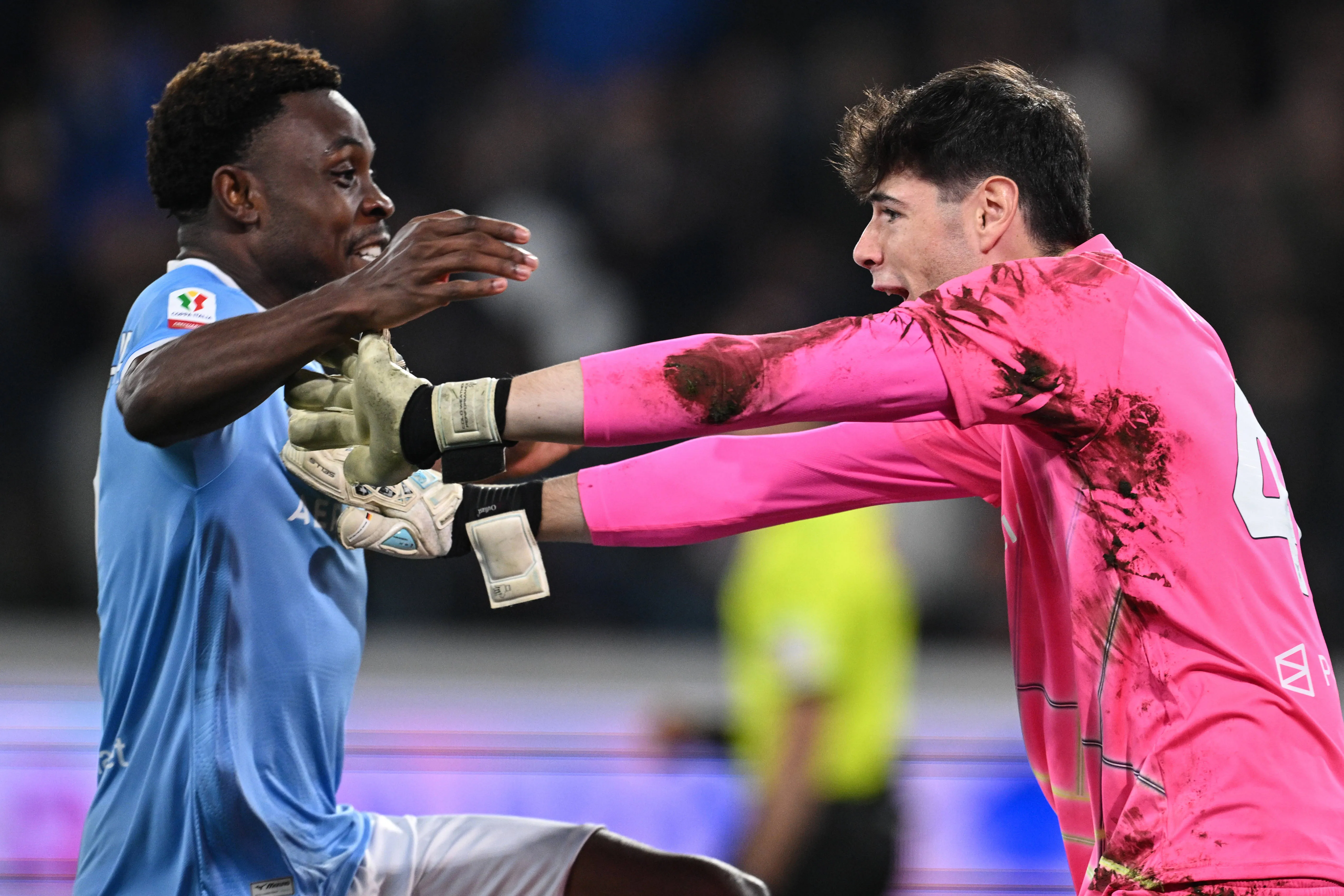 Edoardo Motta and Fisayo Dele-Bashiru in action for Lazio