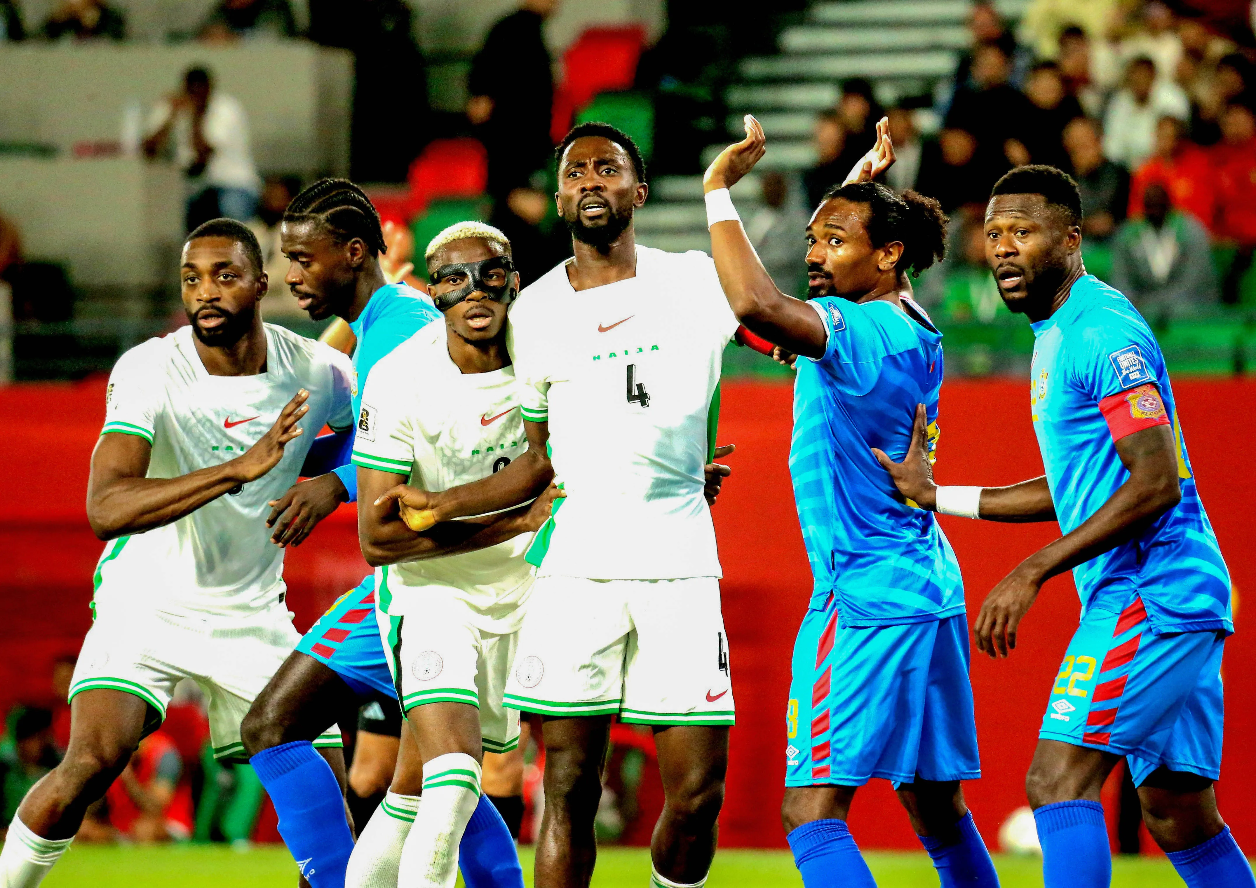 Semi Ajayi, Victor Osimhen and Wilfred Ndidi of Super Eagles of Nigeria and Samuel Moutoussamy and Chancel Mbemba of Dr Congo during the 2026 FIFA World Cup playoff