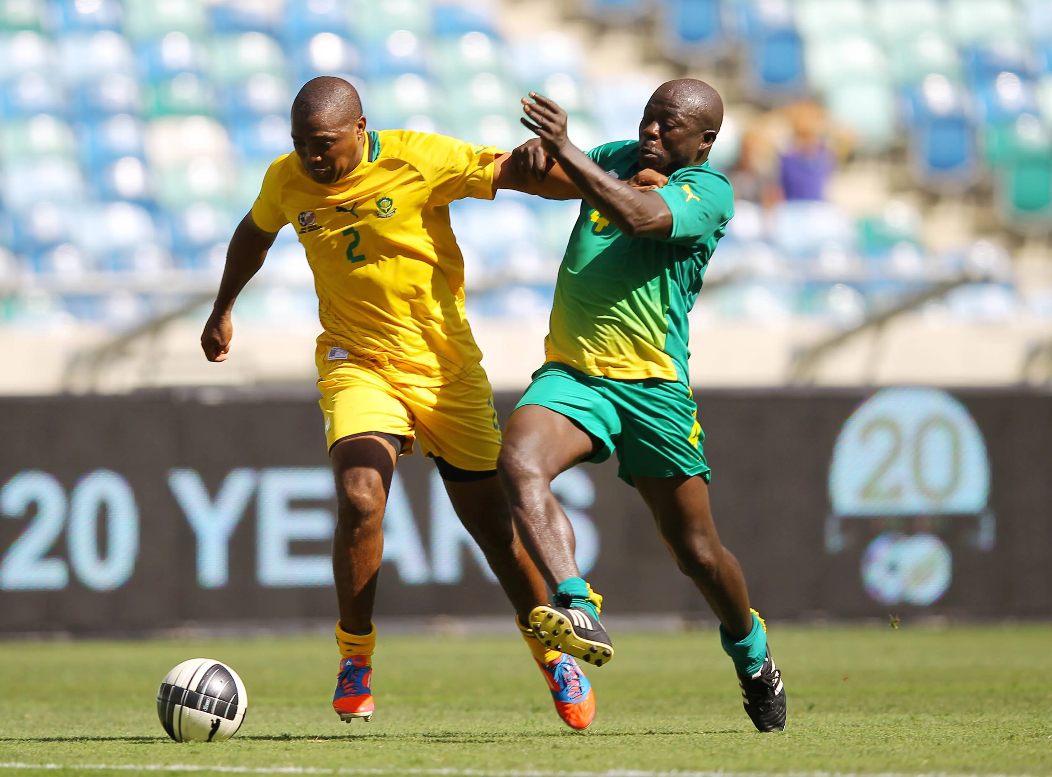 Fani Madida holds off Kaitano Tembo during the Friendly match between South African Legends and African Legends