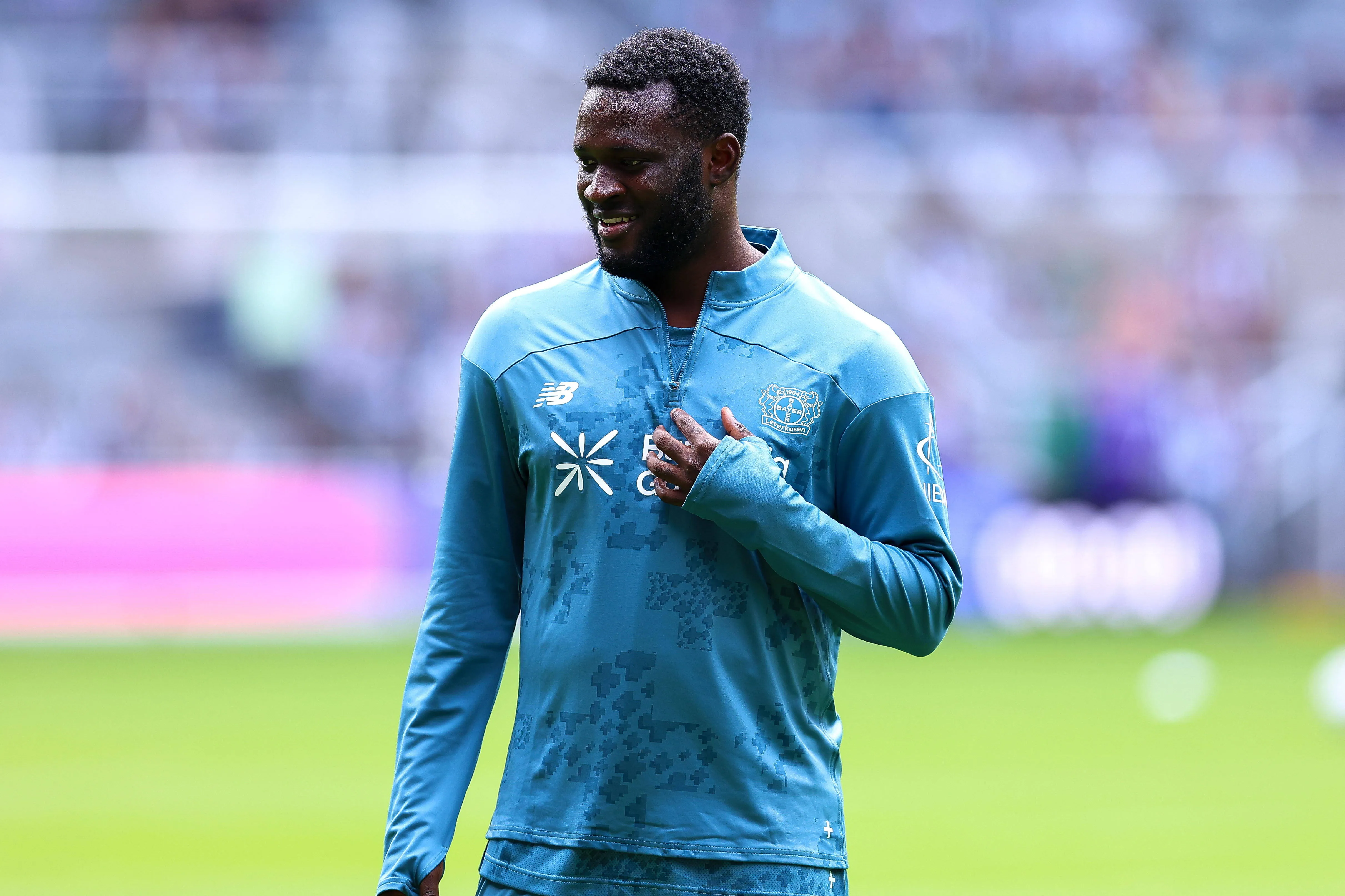 Victor Boniface of Bayer 04 Leverkusen warms up