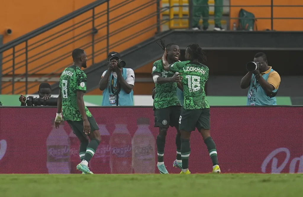 Ademola Lookman and Moses Simon celebrates goal against Angola