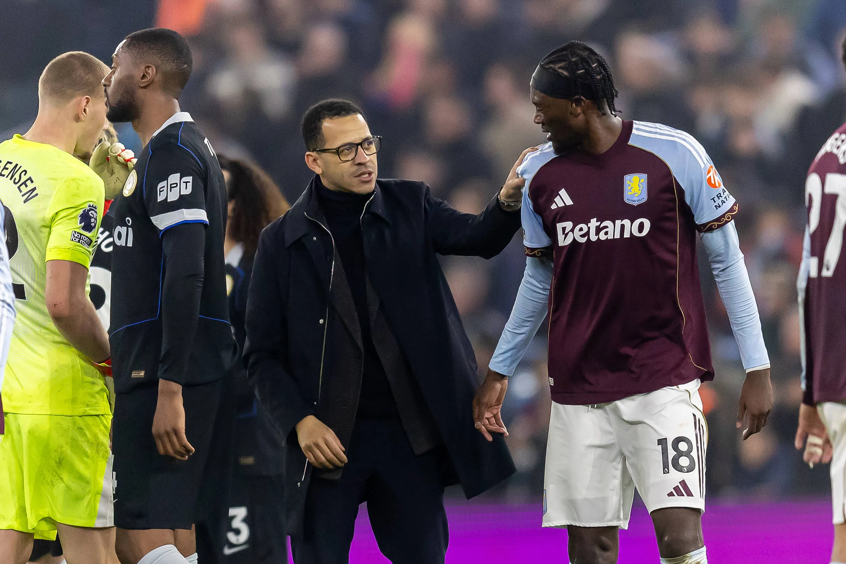 Chelsea Head Coach Liam Rosenior puts hand on shoulder of ex-Chelsea player Tammy Abraham