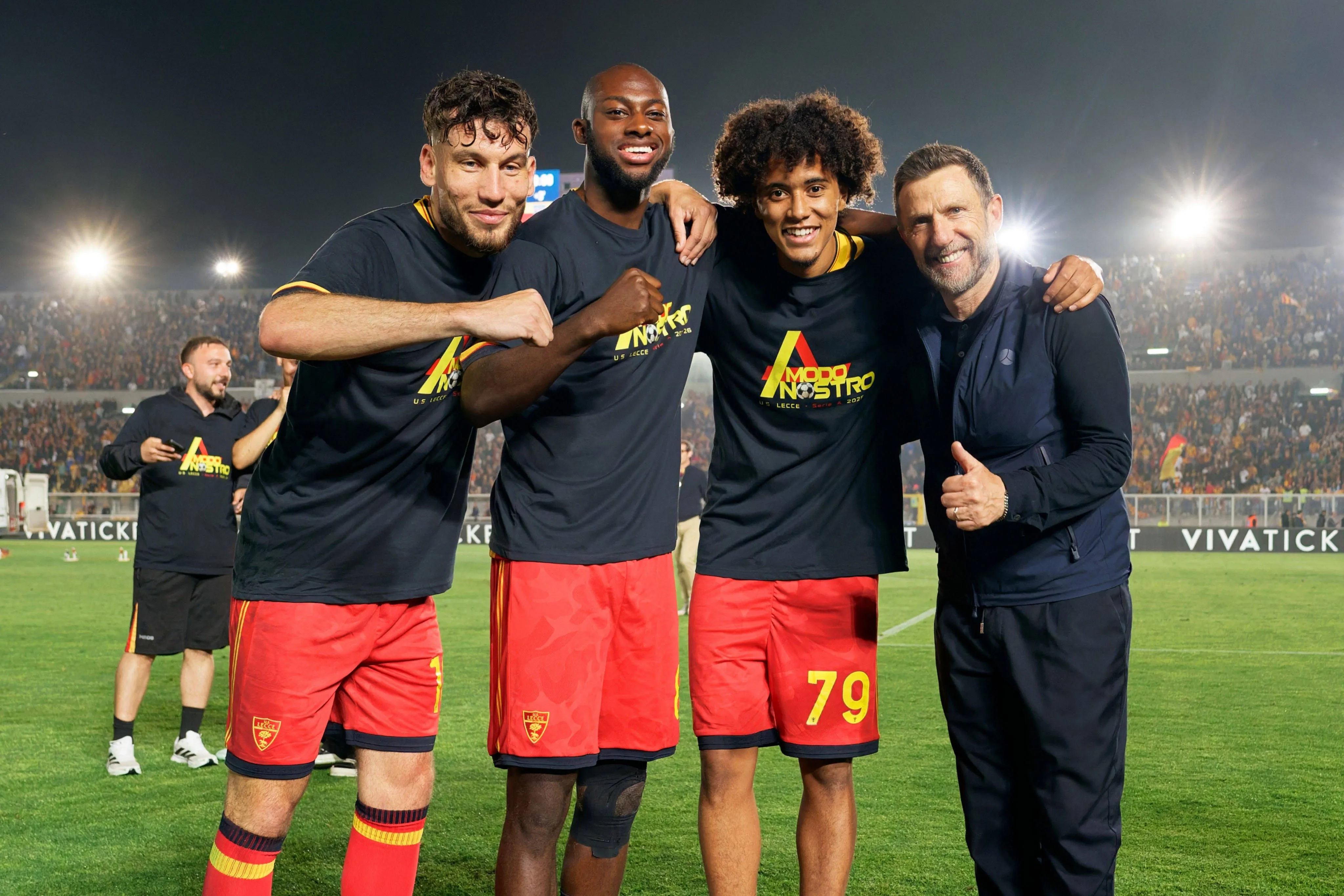 Coach Eusebio Di Francesco of US Lecce celebrates with players.
