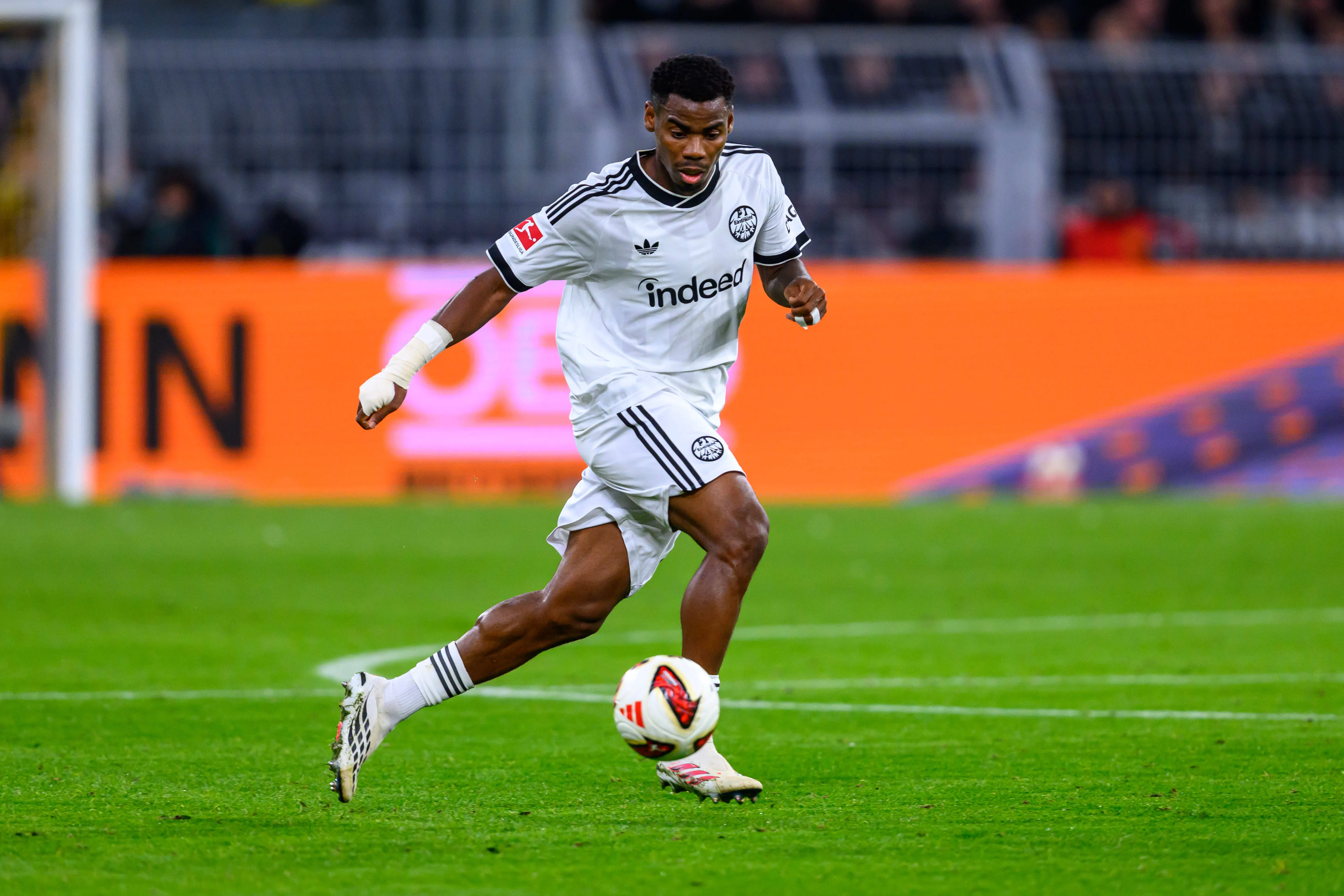 Raphael Onyedika of Eintracht Frankfurt runs with the ball