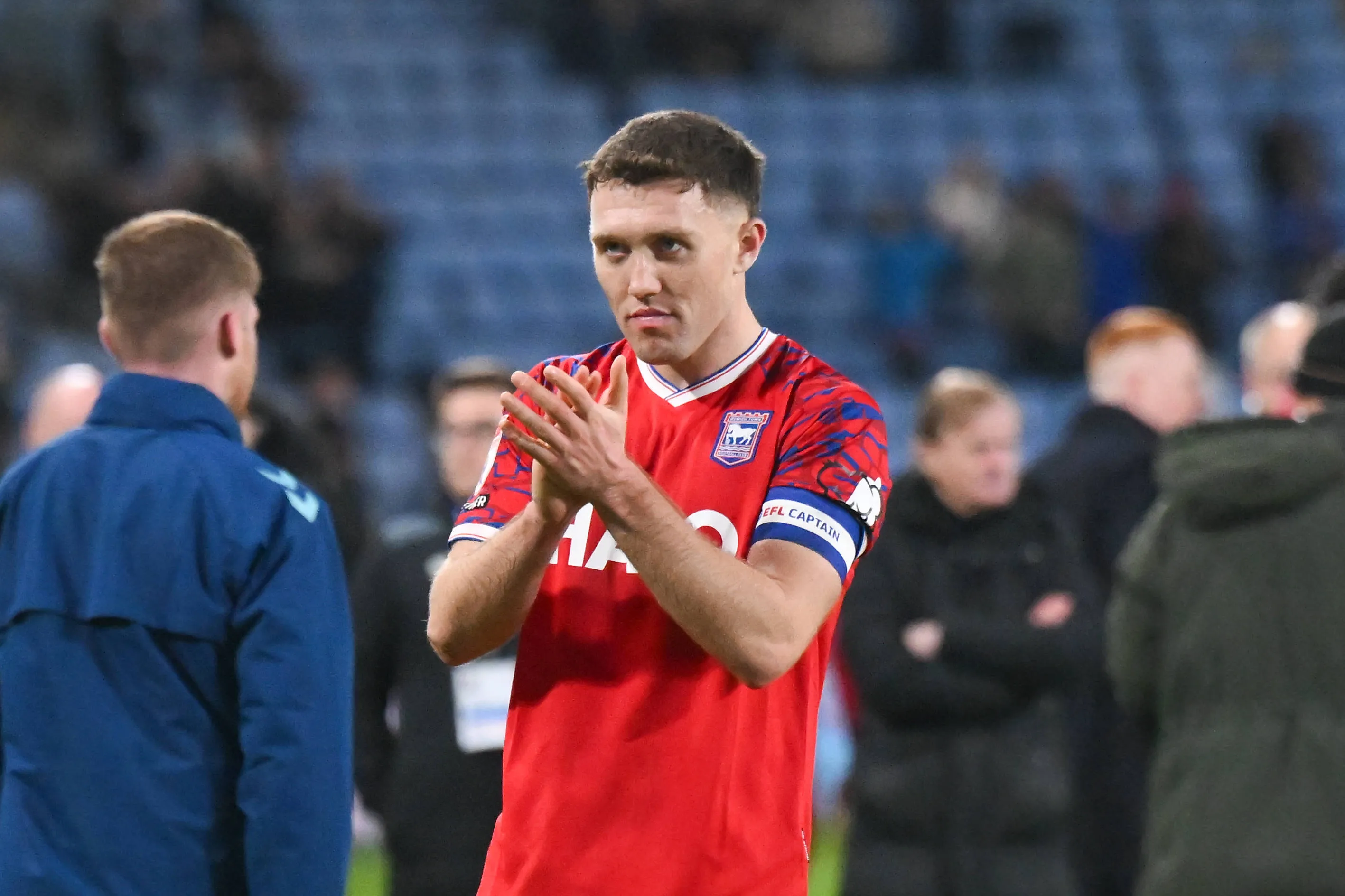 Dara O'Shea of Ipswich Town applauds fans