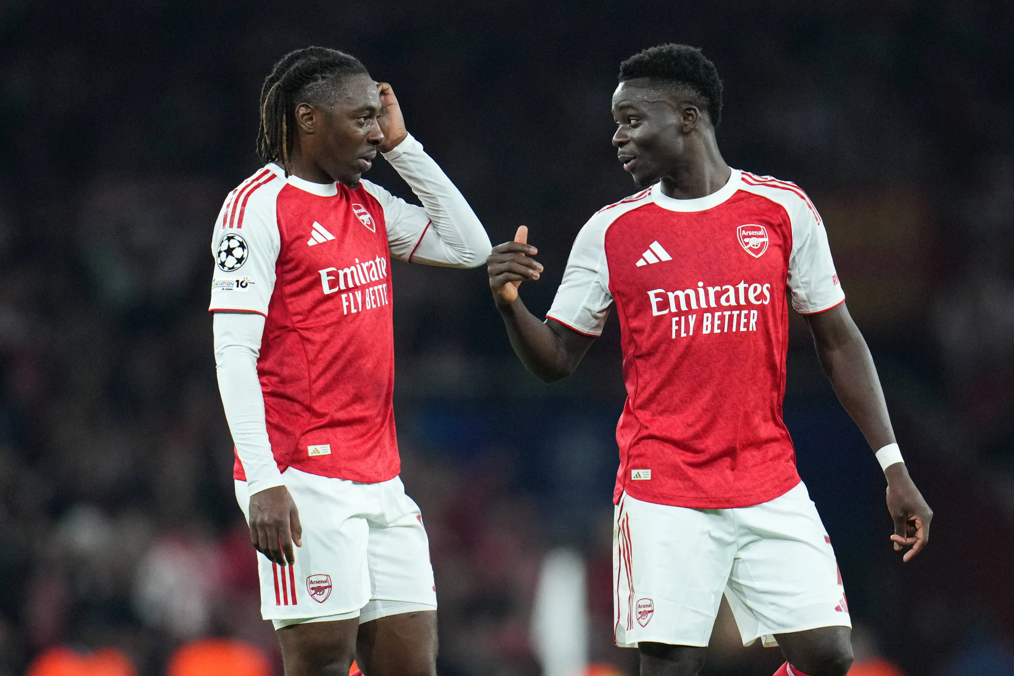Eberechi Eze of Arsenal and Bukayo Saka of Arsenal at full time during the UEFA Champions League match Arsenal vs Olympiakos