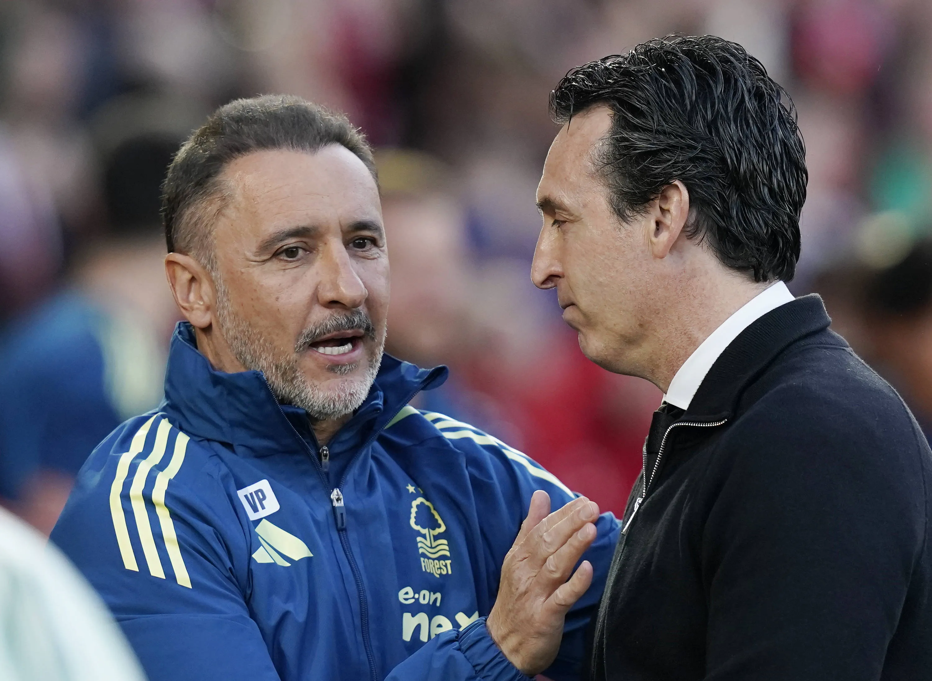 Victor Pereira manager of Nottingham Forest l welcomes Unai Emery head coach of Aston Villa r during the Nottingham Forest vs Aston Villa UEFA Europa League Semi Final 1st leg match at the City Ground, Nottingham