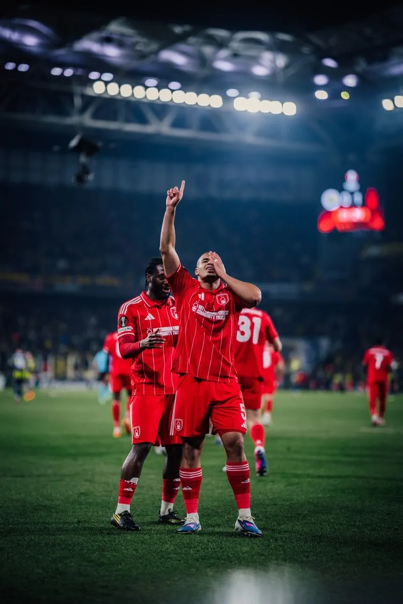 Ola Aina behind Murillo who celebrates a Nottingham Forest goal