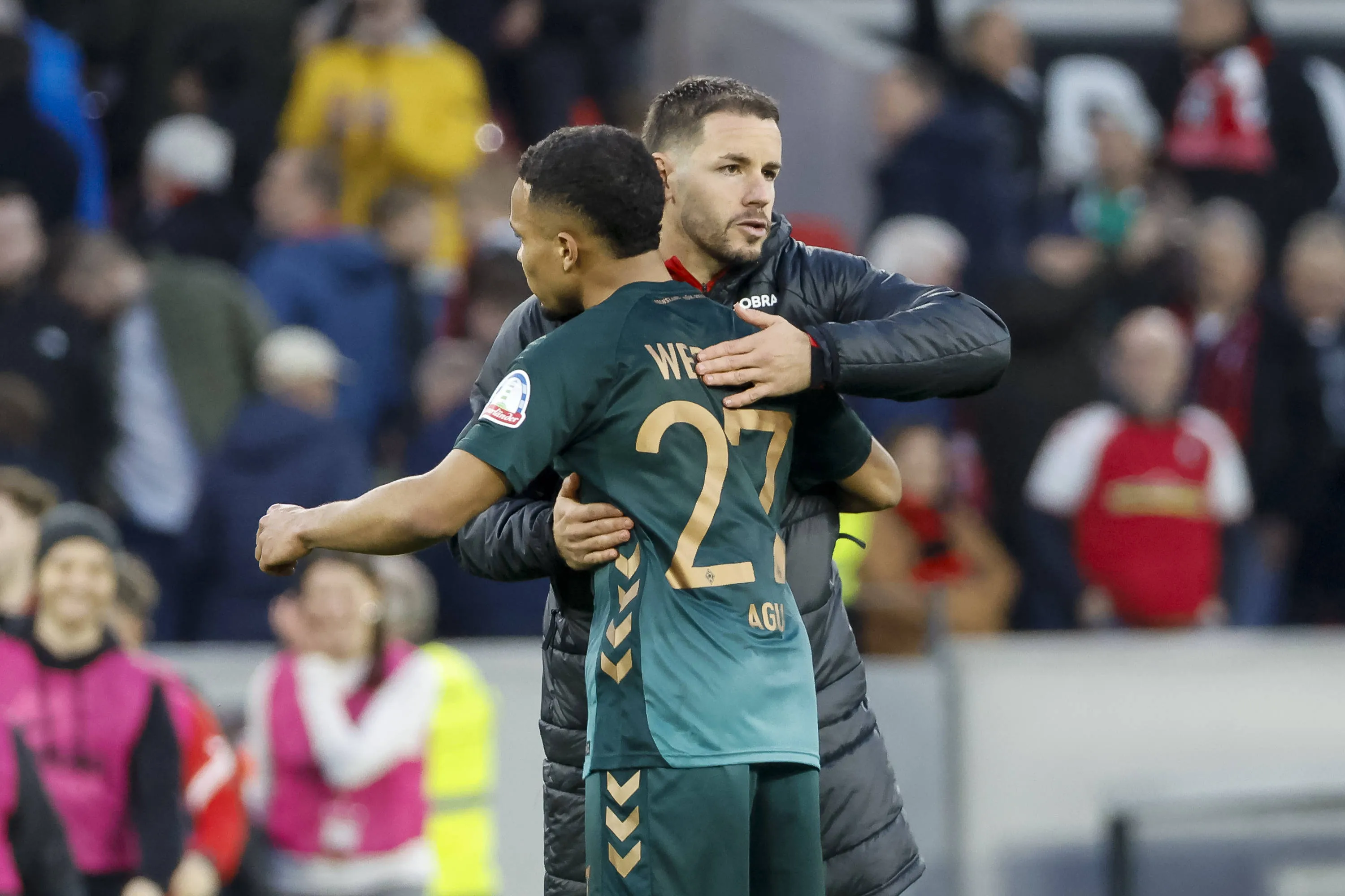 Felix Agu and Christian G&uuml;nter of SV Werder Bremen