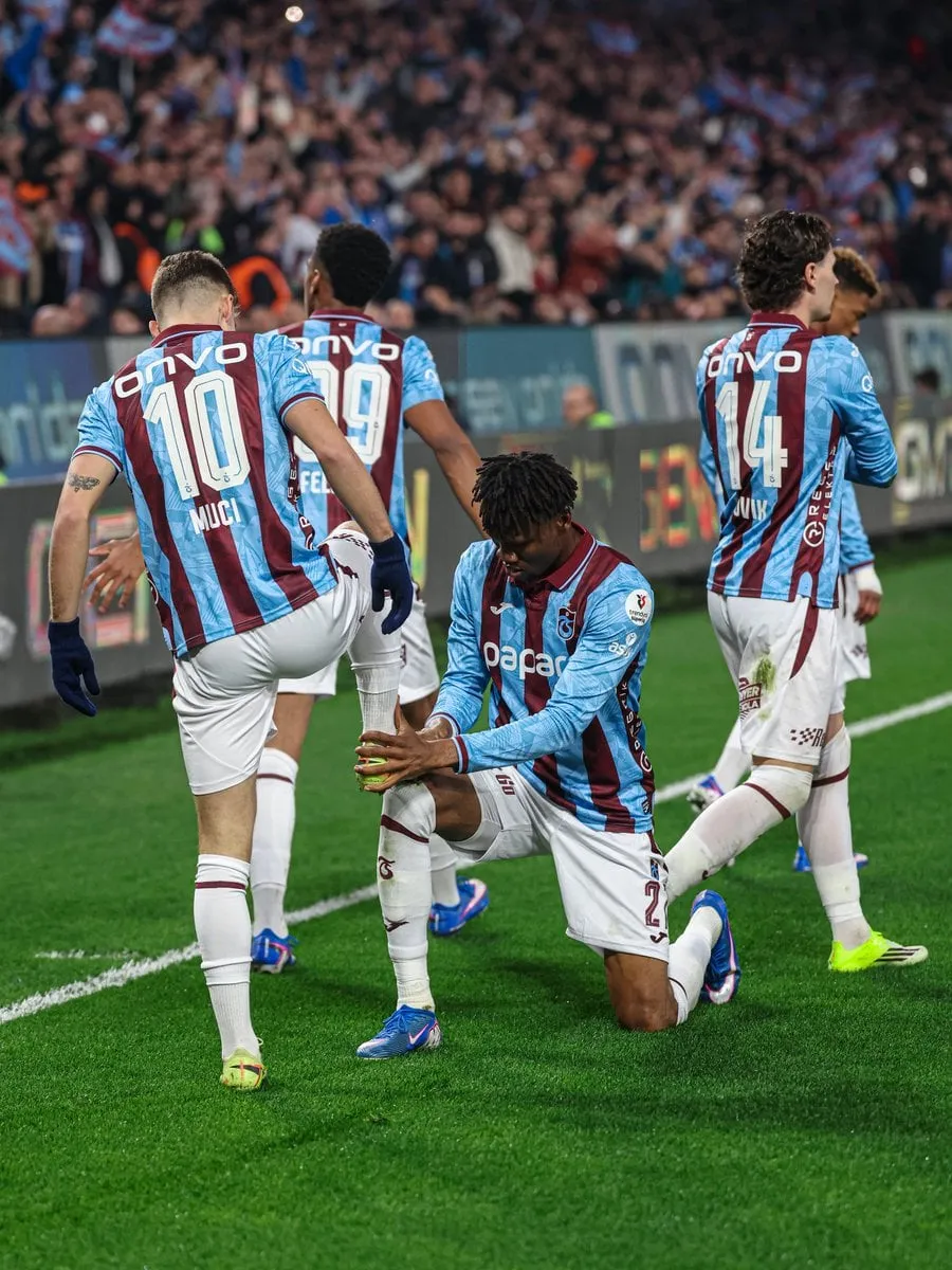 Chibuike Nwaiwu and other Trabzonspor players celebrating a goal