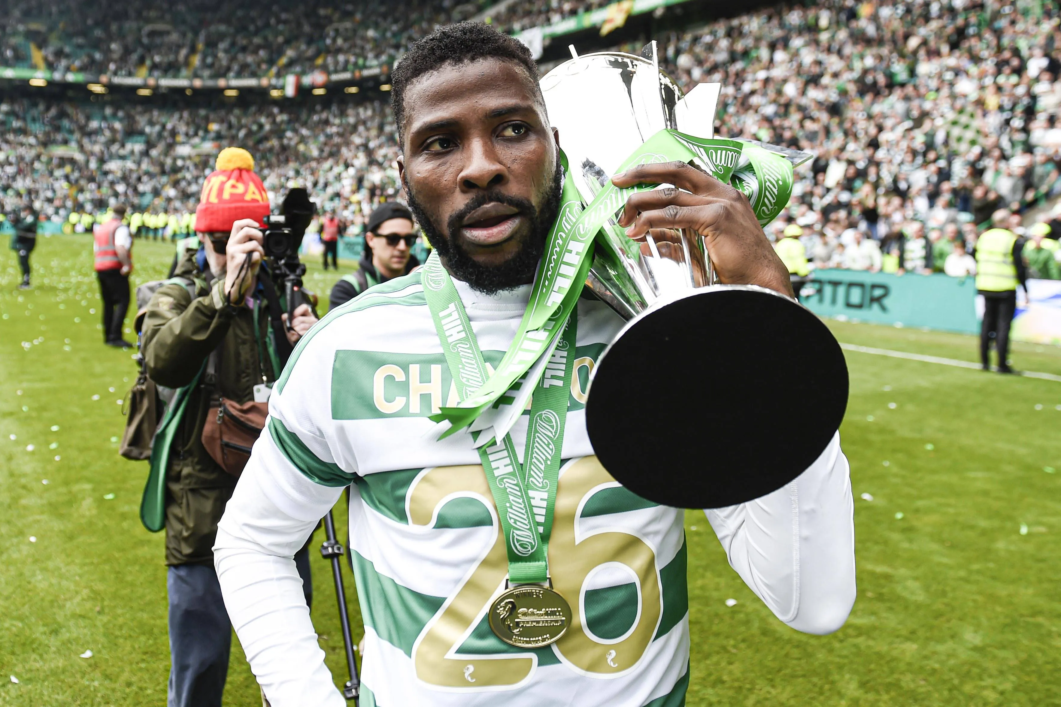 Super Eagles and Celtic star Kelechi Iheanacho poses with the Premiership trophy
