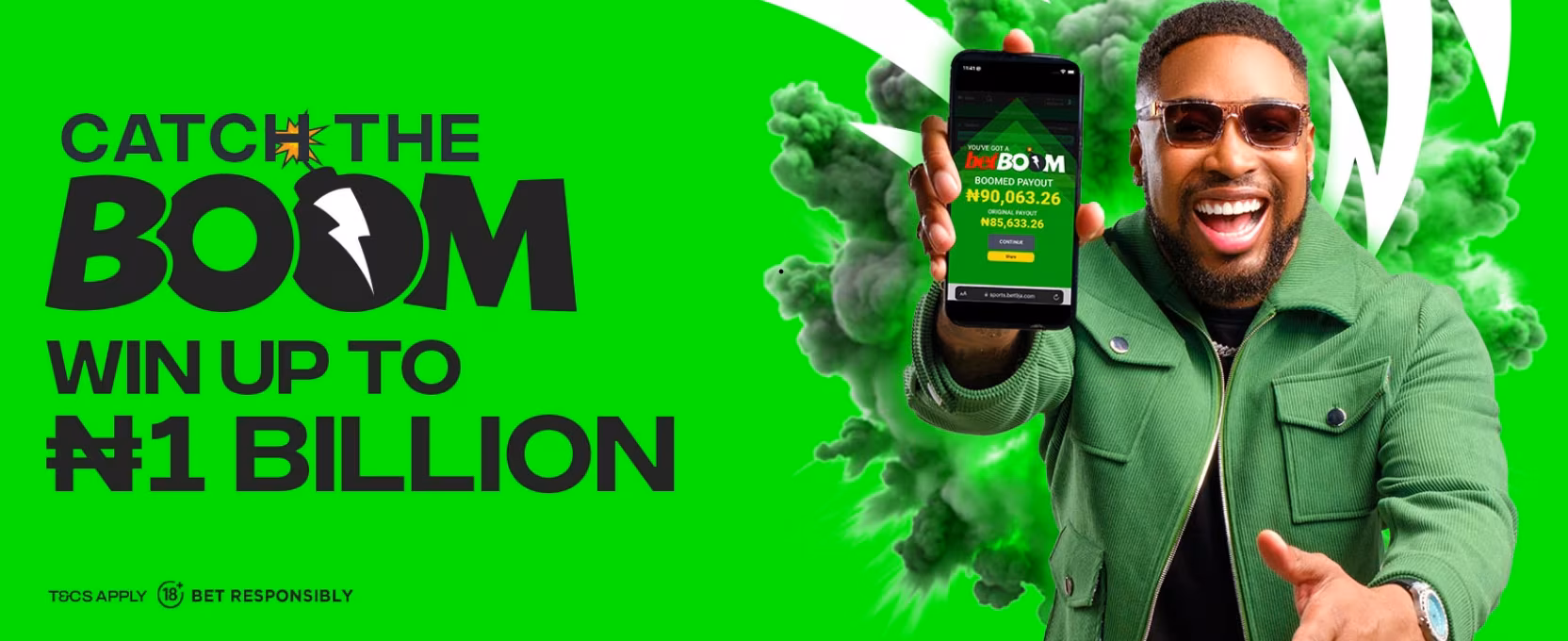 Bet9ja betBOOM promotion banner showing a smiling customer holding a mobile phone displaying a BOOMED sports bet payout.
