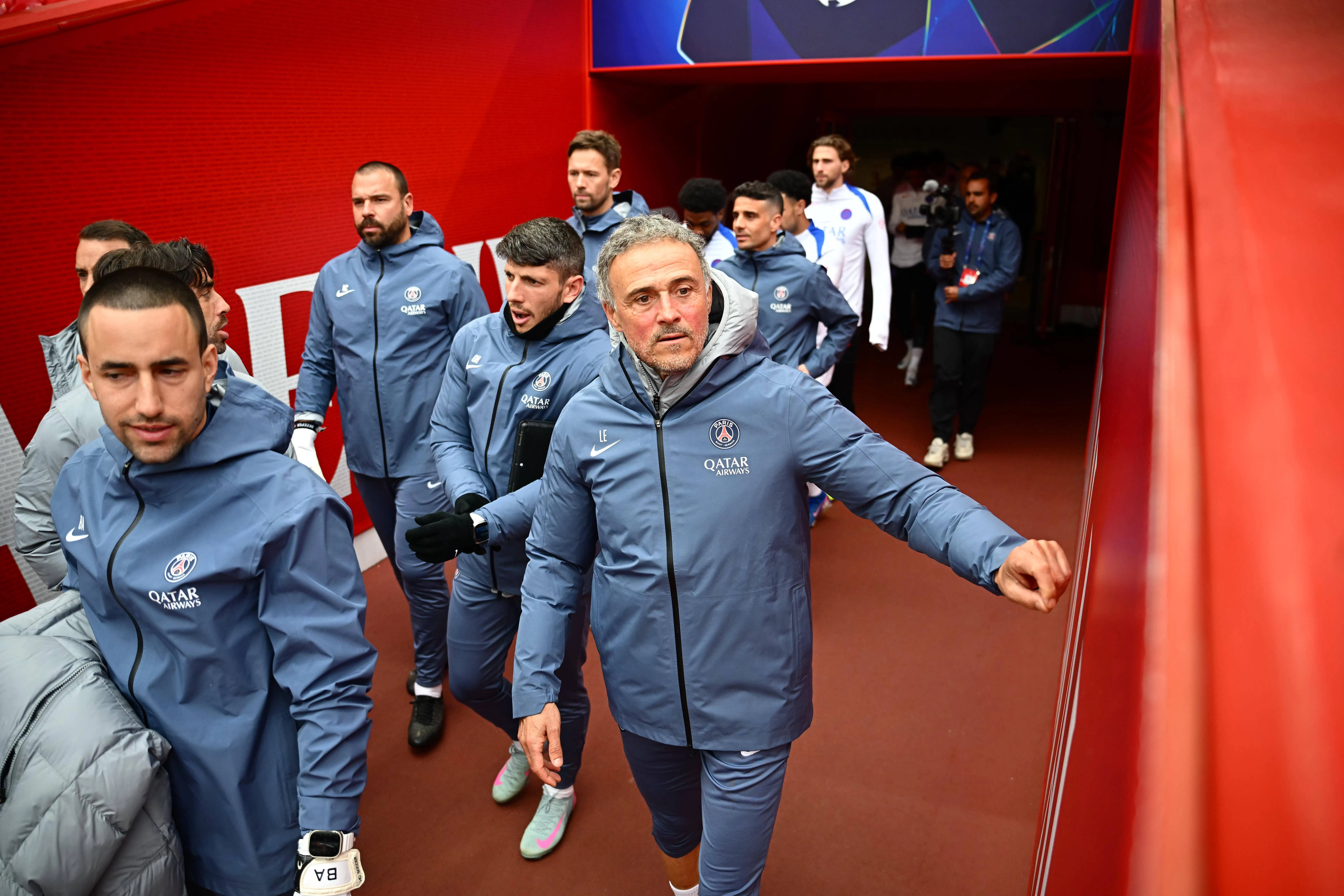 Luis Enrique and PSG coaching staff.