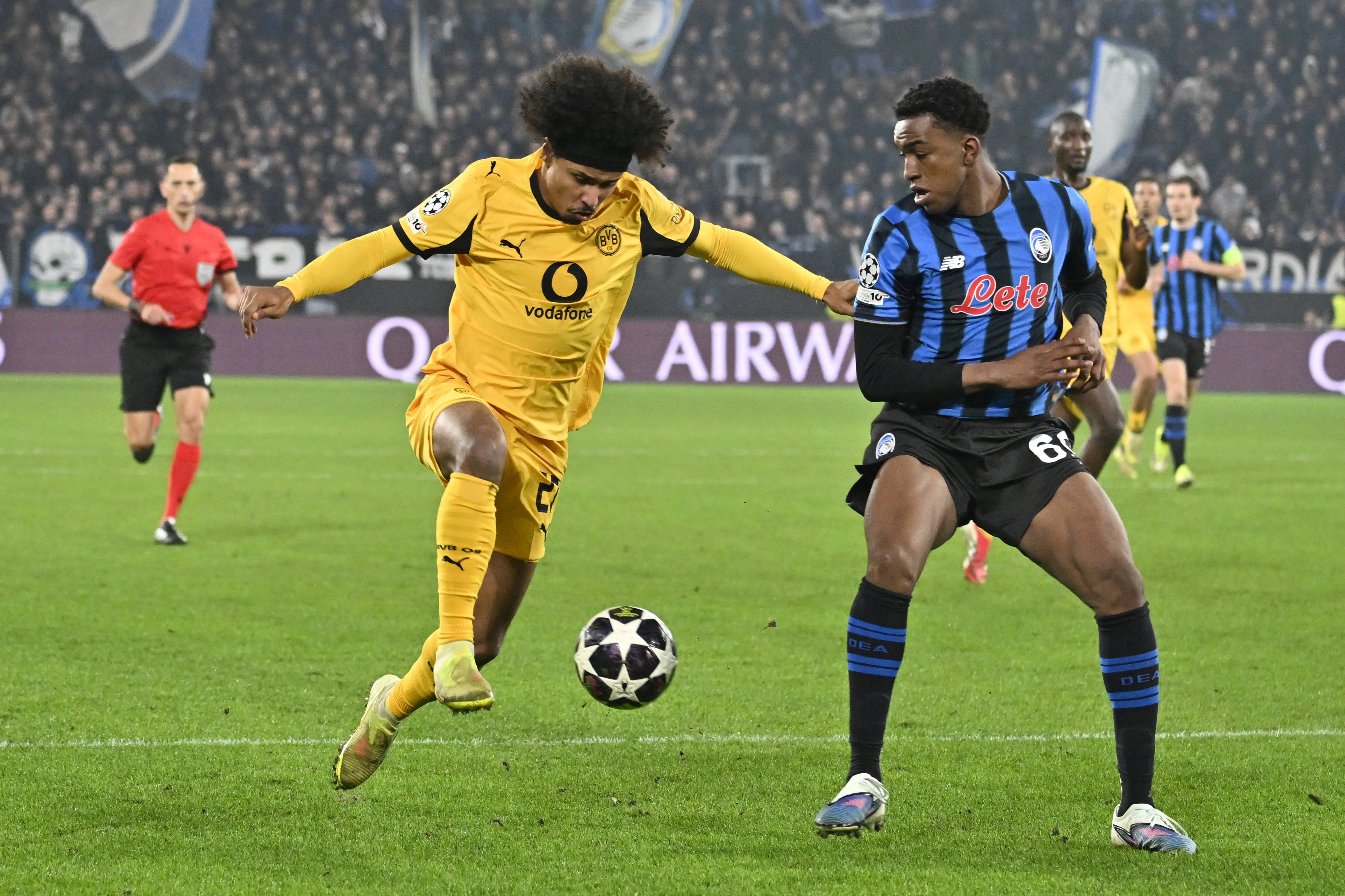 Atalanta defender Honest Ahanor and Dortmund's Karim Adeyemi