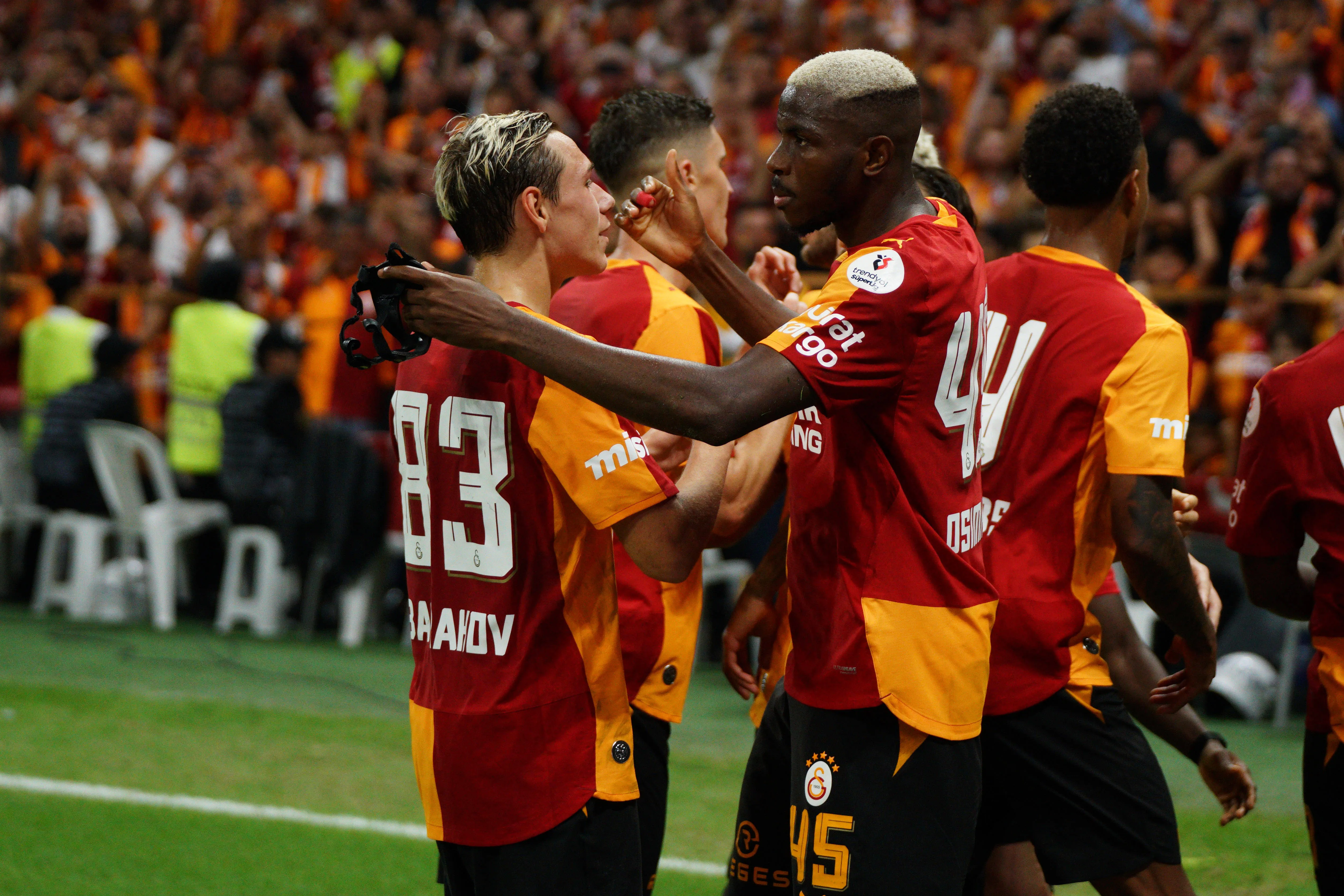 Victor Osimhen C-R and Aleksey Batrakov C-L of Galatasa