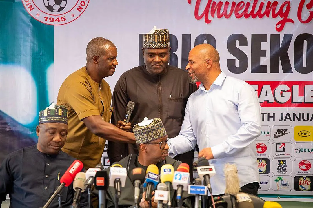 Coach Augustine Eguavoen, Technical Director left with Chelle right during the unveiled the new Head Coach of the Super Eagles, Eric S&Atilde; kou Chelle at the Media Conference Room of the MKO Abiola National Stadium on January 13, 2025 in Abuja, Nigeria