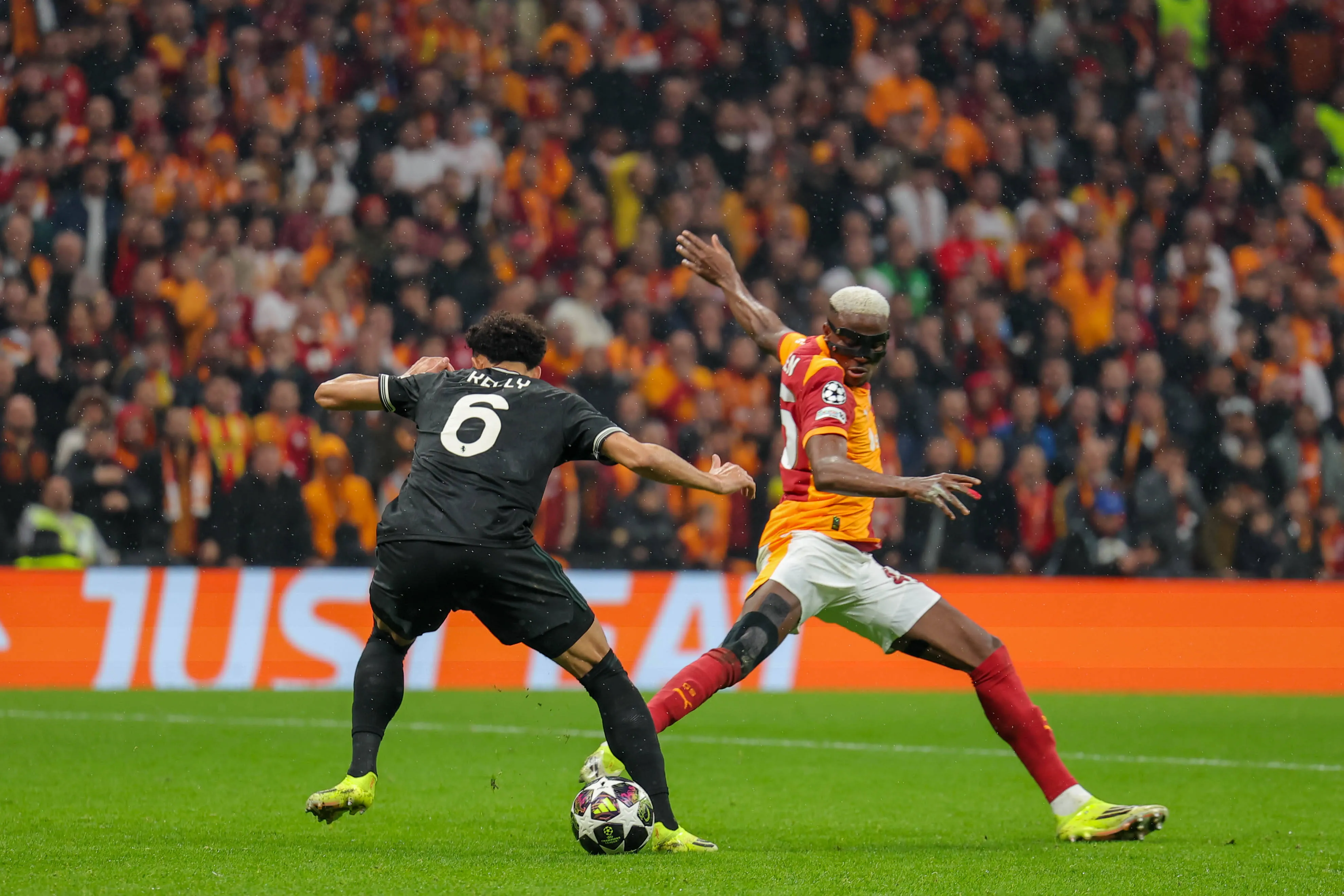 Victor Osimhen and Lloyd Kelly during the UEFA Champions League Knockout Play-off First Leg match between Galatasaray SK and Juventus FC