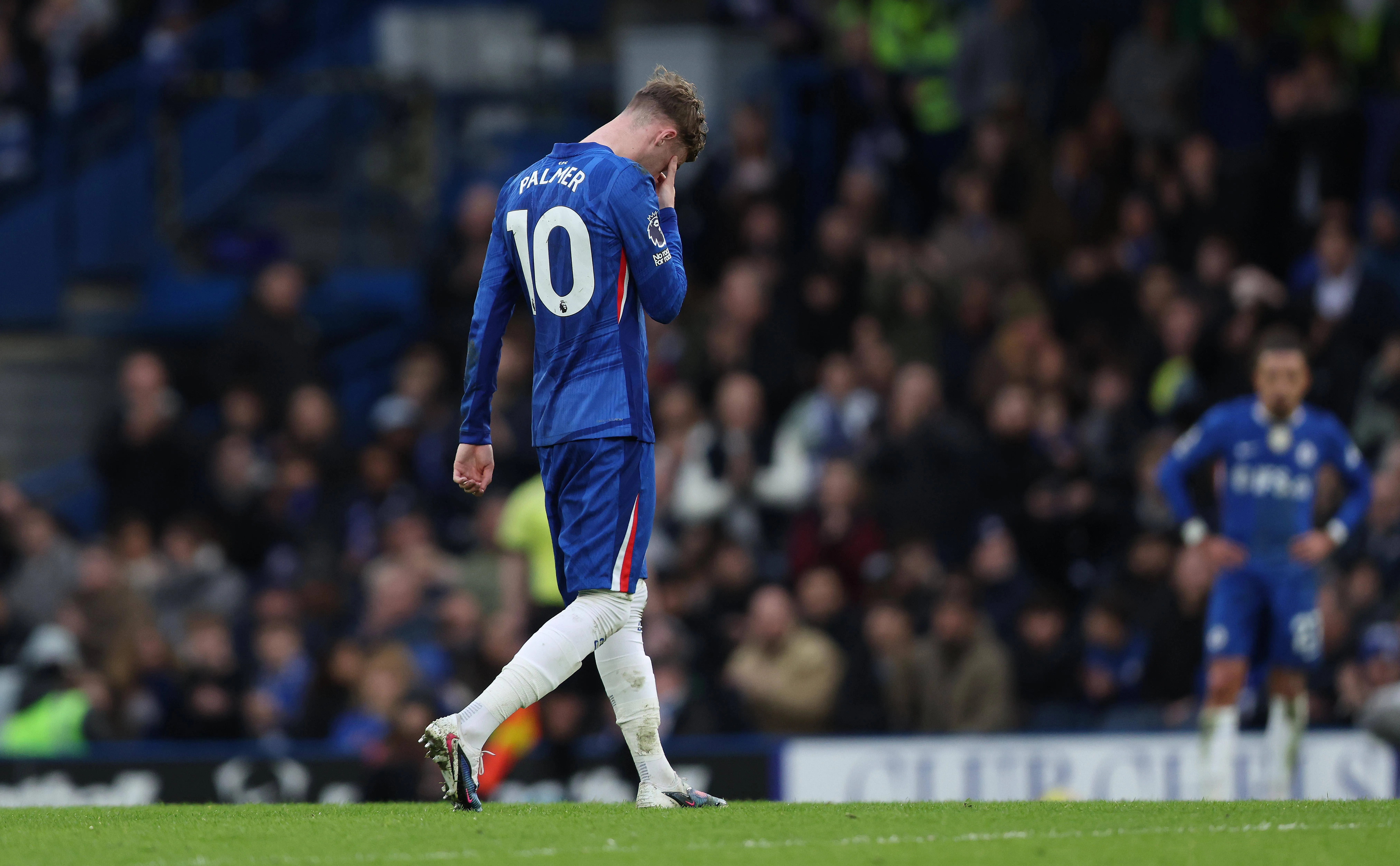 Cole Palmer looks disappointed and dejected during the match between Chelsea FC and Burnley FC.