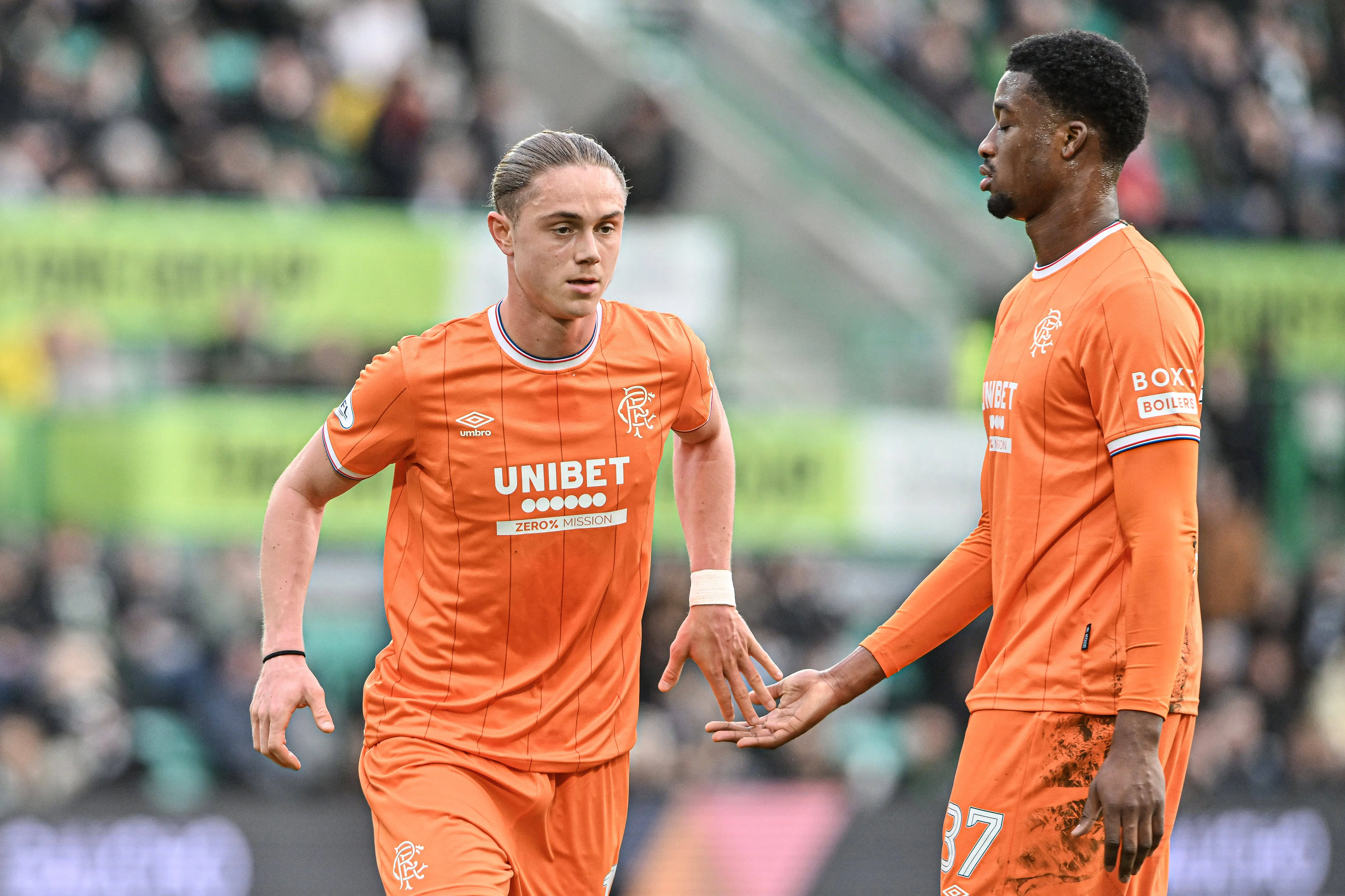 Thelo Aasgaard high fives Emmanuel Fernandez during the William Hill Premiership match at Easter Road, Edinburgh