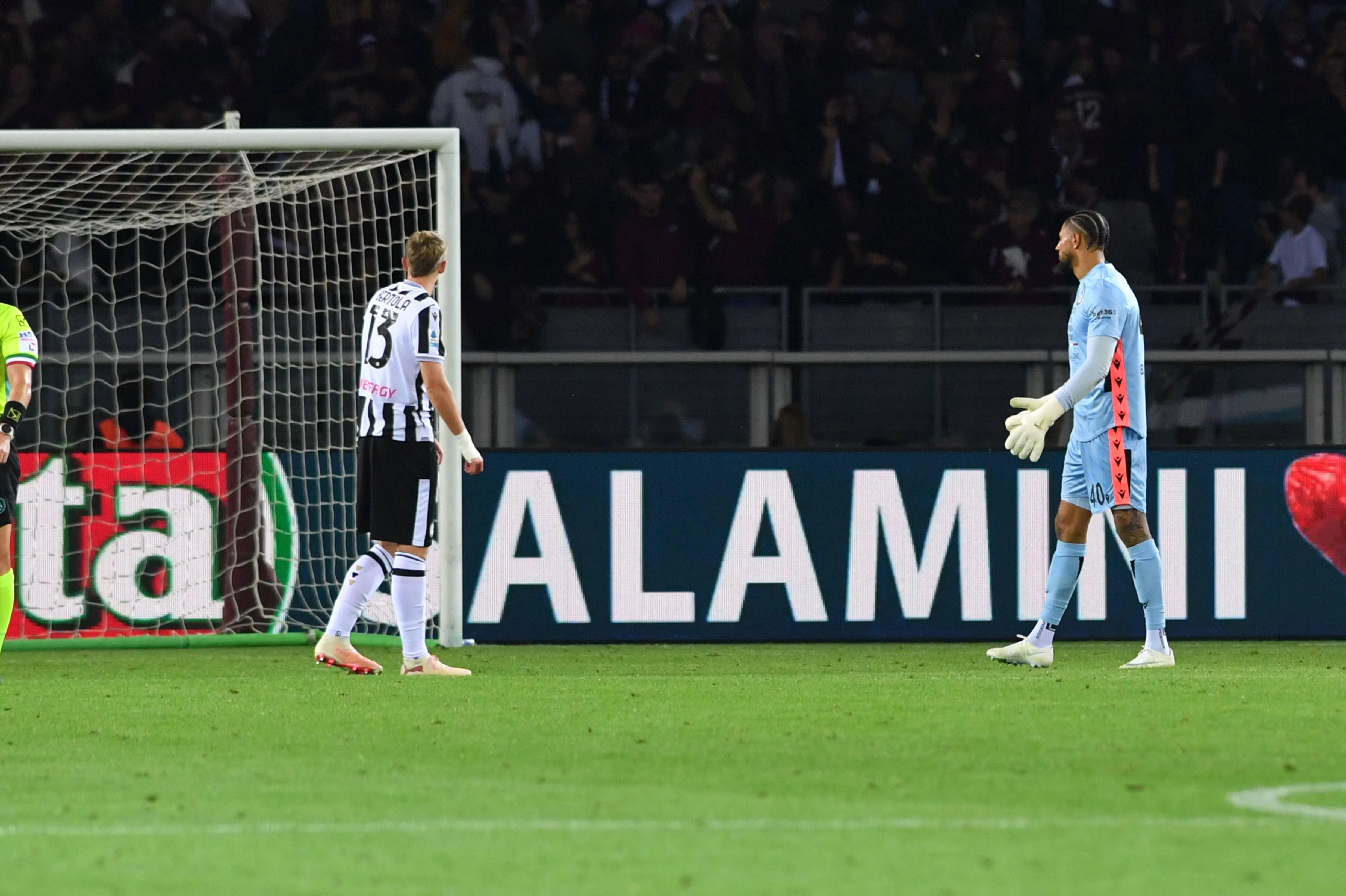 Maduka Okoye watches on against Torino