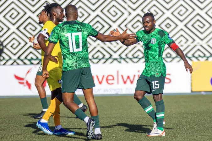 Kelechi Iheanacho celebrates goal against Zimbabwe with Moses Simon