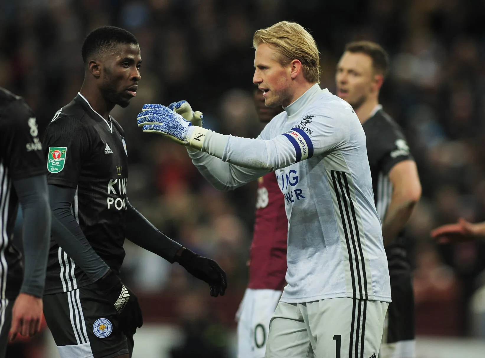 Kasper Schmeichel talks to Kelechi Iheanacho at Villa Park