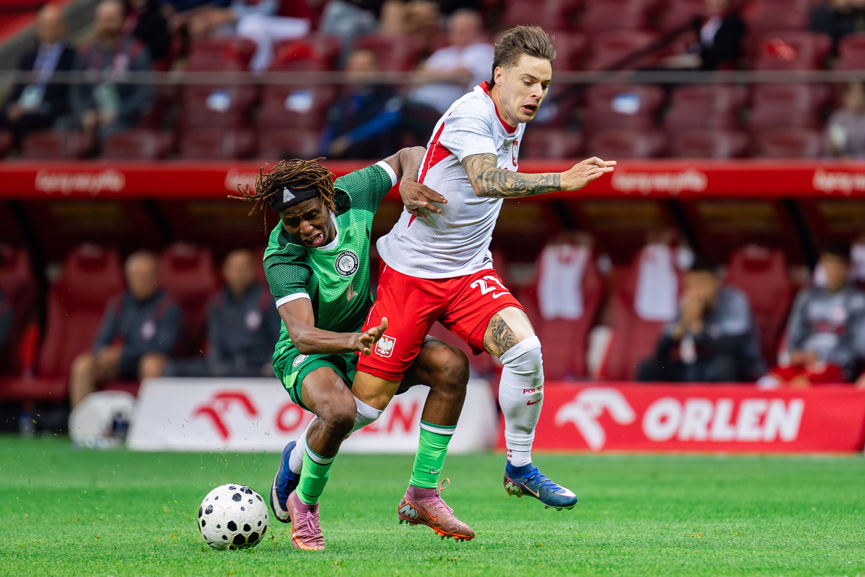 Abdullahi Bewene of Nigeria and Nicola Zalewski of Poland in action