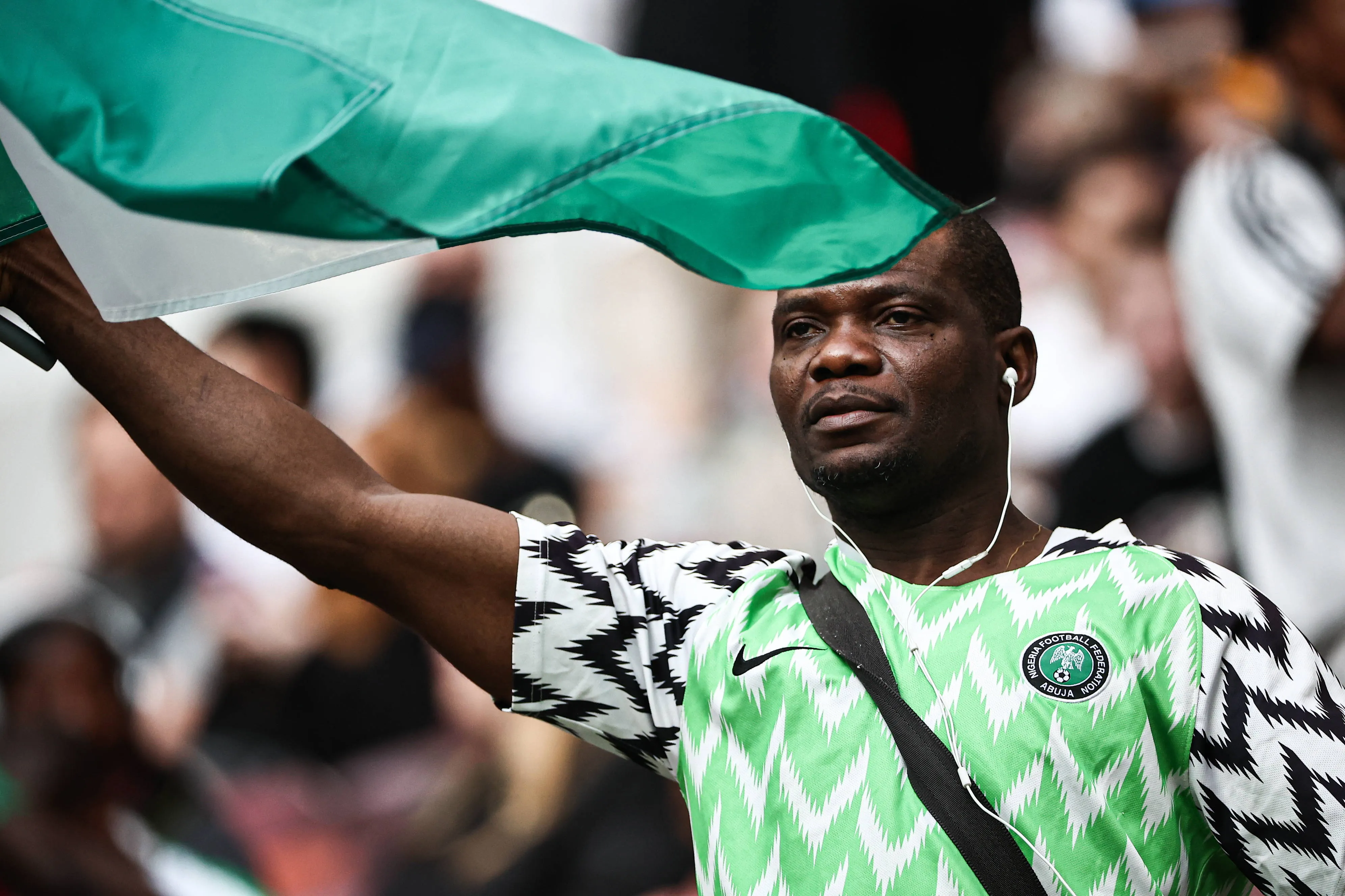 A Nigerian fan roots for the Super Eagles against Russia