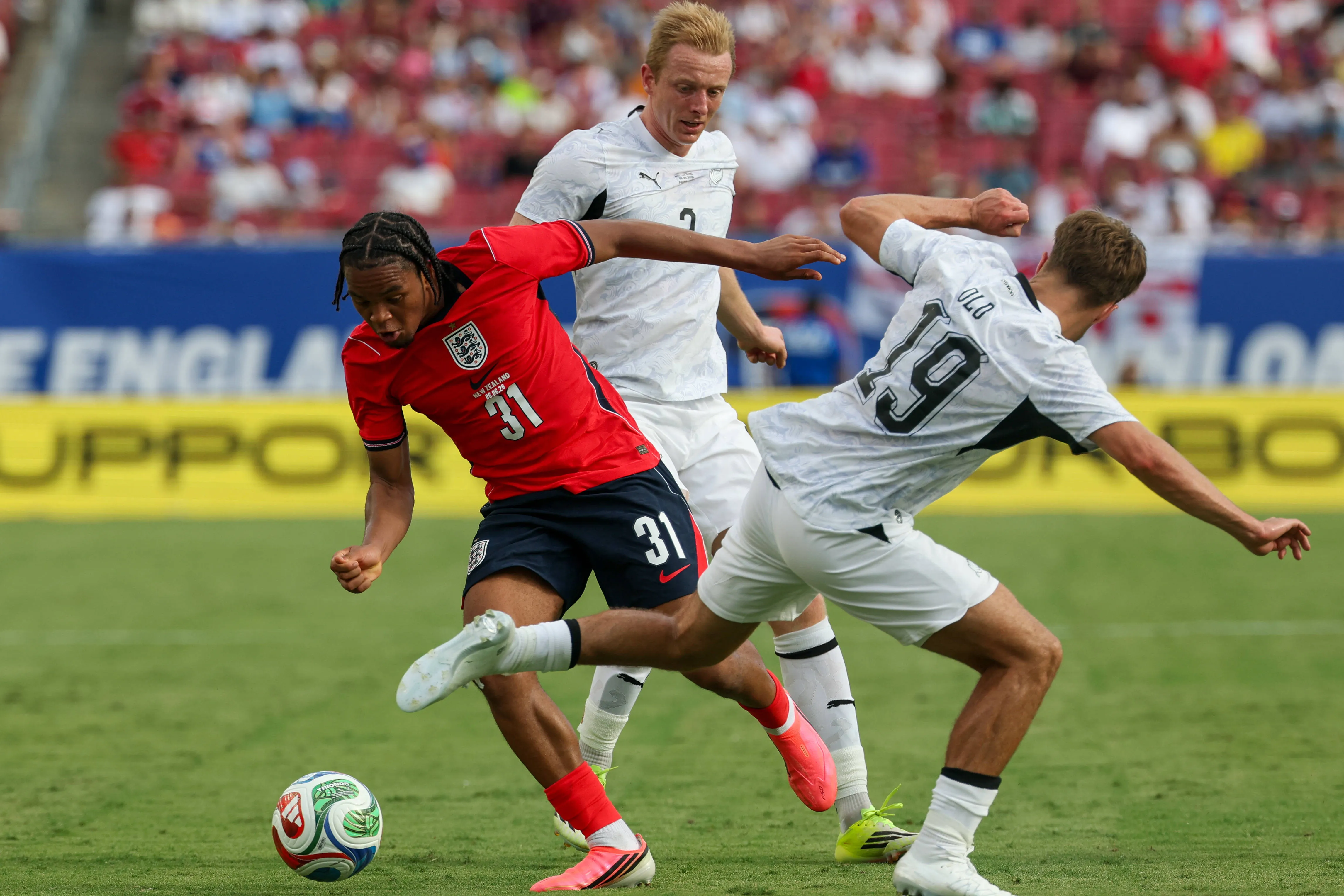 Raymond James Stadium, Tampa, Florida, United States of America Friendly International Football, England versus New Zealand Rio Ngumoha of England escapes a crowd of New Zealand defenders