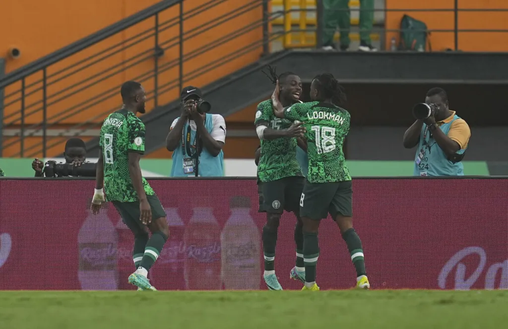 Ademola Lookman and Moses Simon celebrates goal against Angola
