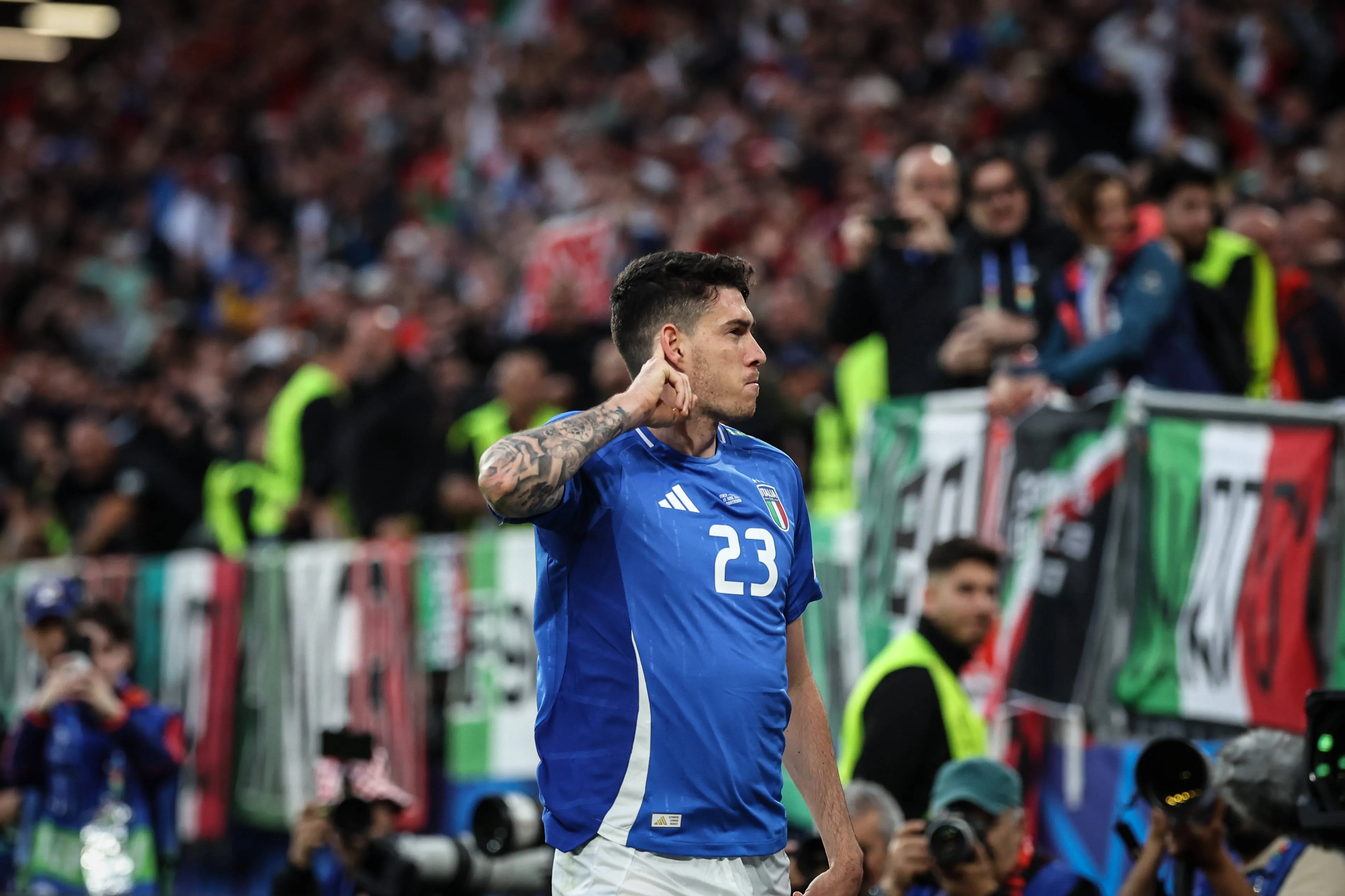 Alessandro Bastoni of Italy celebrates scoring