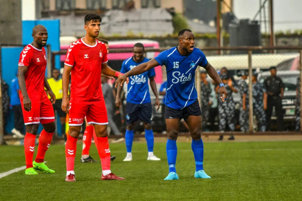RECORD DATE NOT STATED  ABA, NIGERIA – AUGUST 27: Chijioke Mbaoma of Enyimba and Al Ahly Benghazi defenders during the C