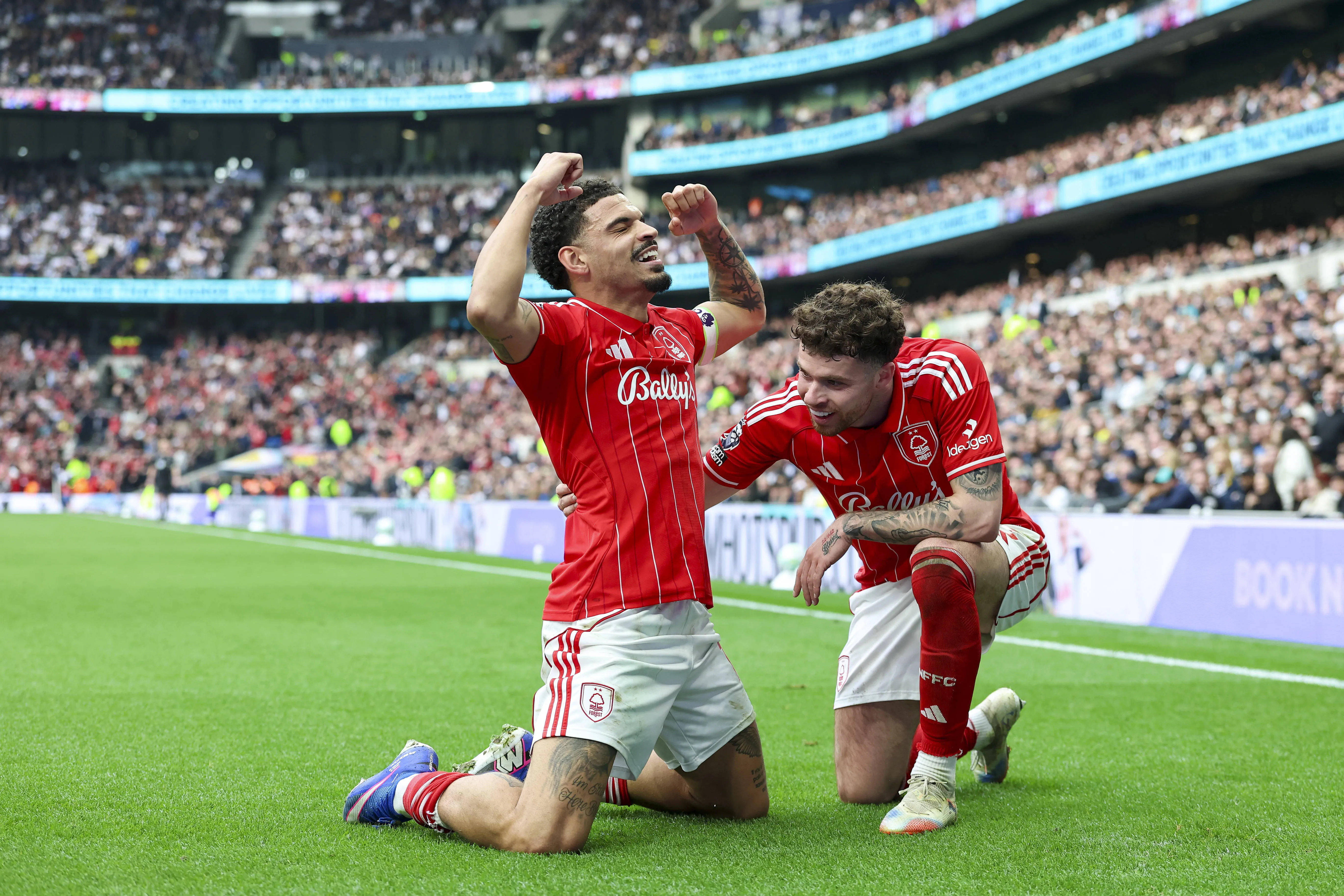 Morgan Gibbs-White scores and celebrates with Neco Williams