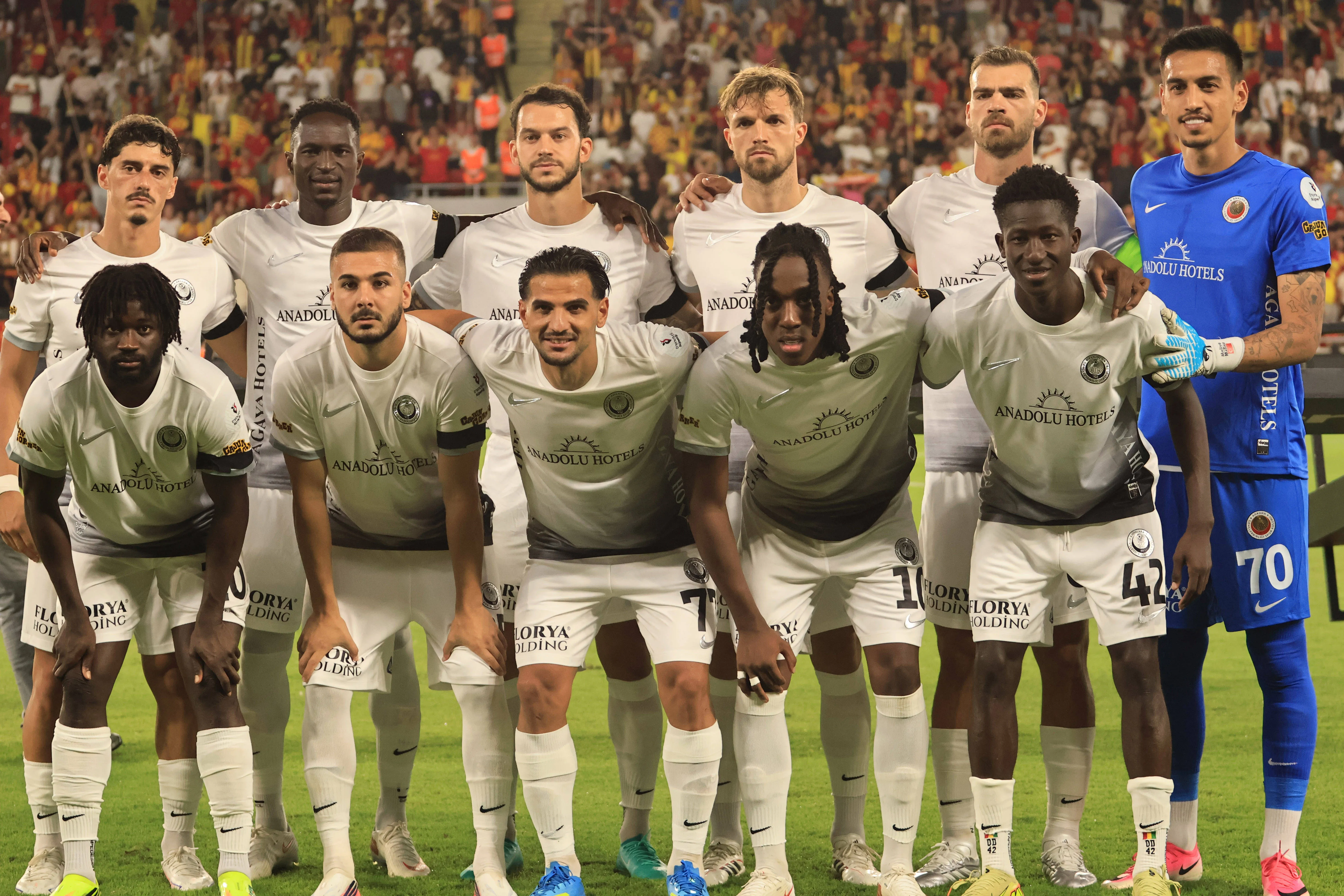 Players of Genclerbirligi poses a team photo.