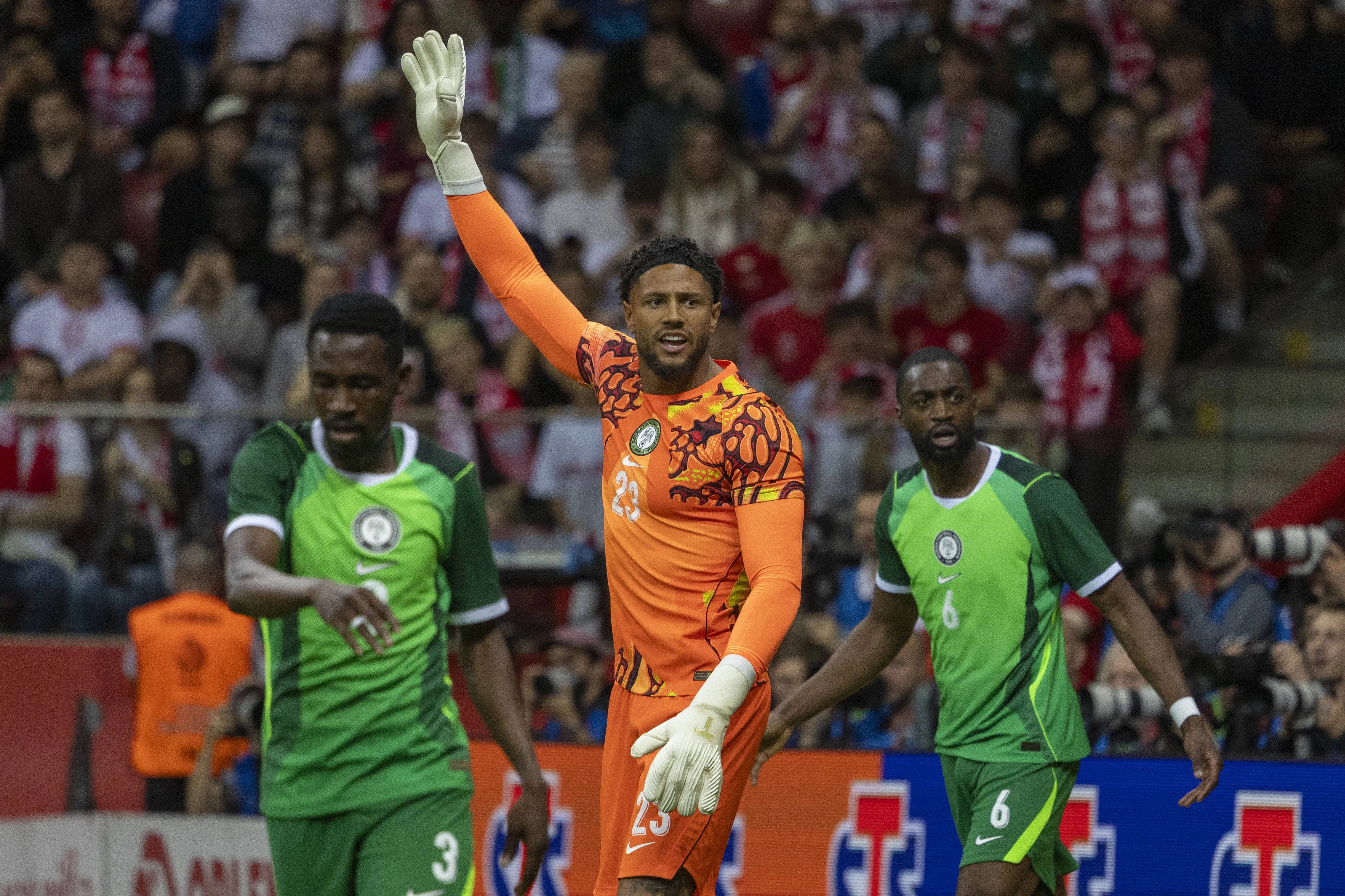 Maduka Okoye celebrates denying Robert Lewandowski