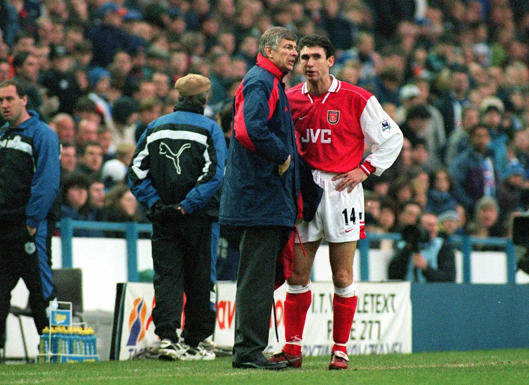 Trainer Arsene Wenger and Martin Keown
