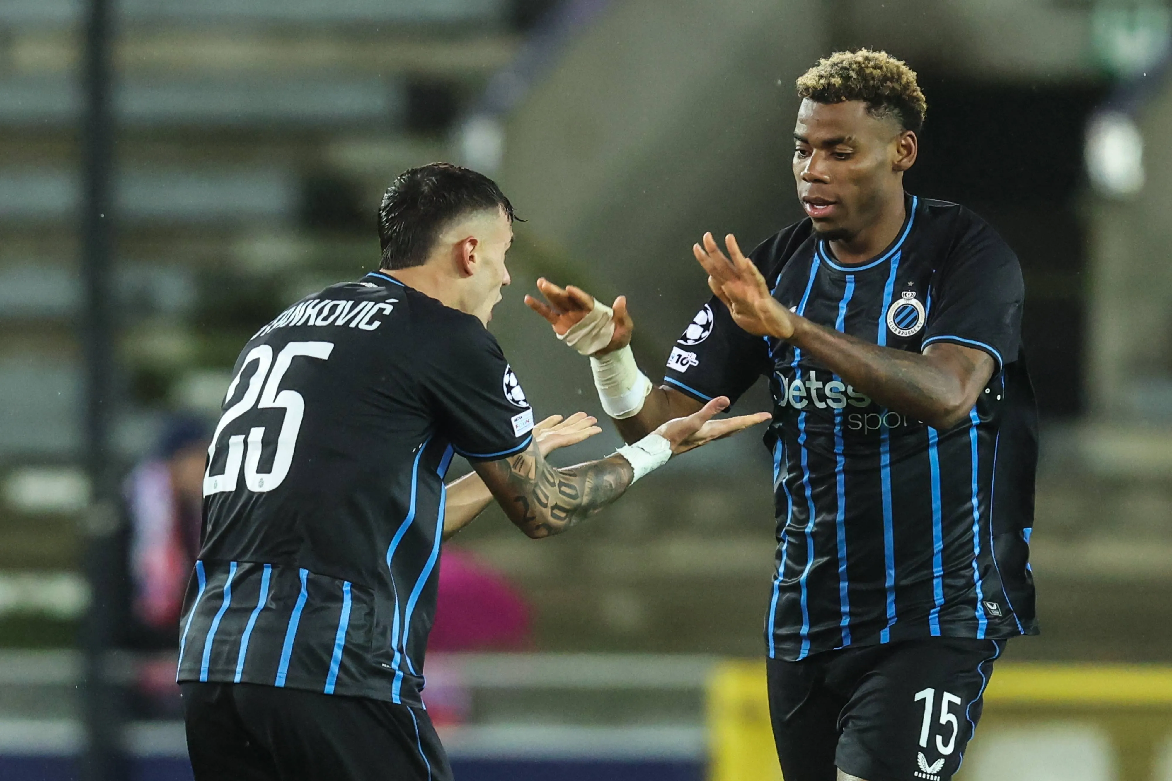 Raphael Onyedika celebrates after scoring during a soccer game between Belgian Club Brugge KV and Spanish Atletico de Madrid